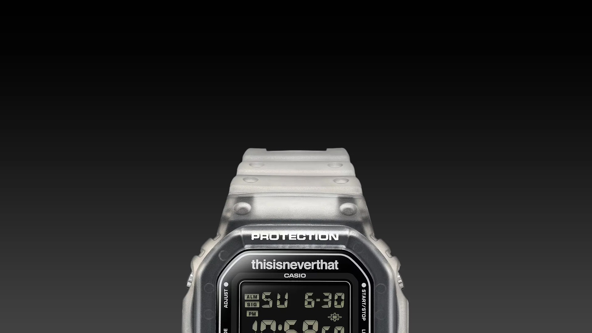 Digital Casio watch with a translucent frosted strap and "thisisneverthat" branding on the face.