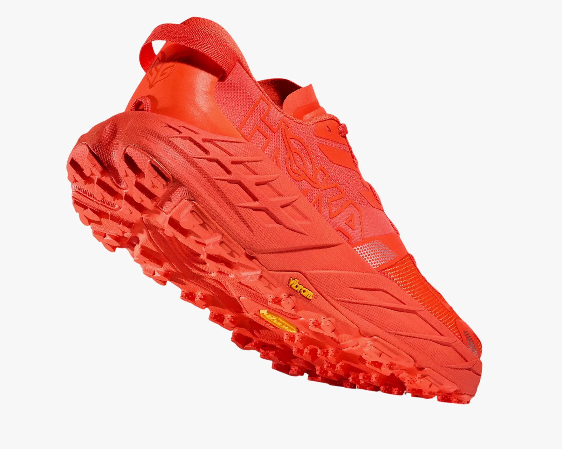 Bright red trail running shoe with aggressive Vibram sole and pull tab on heel.