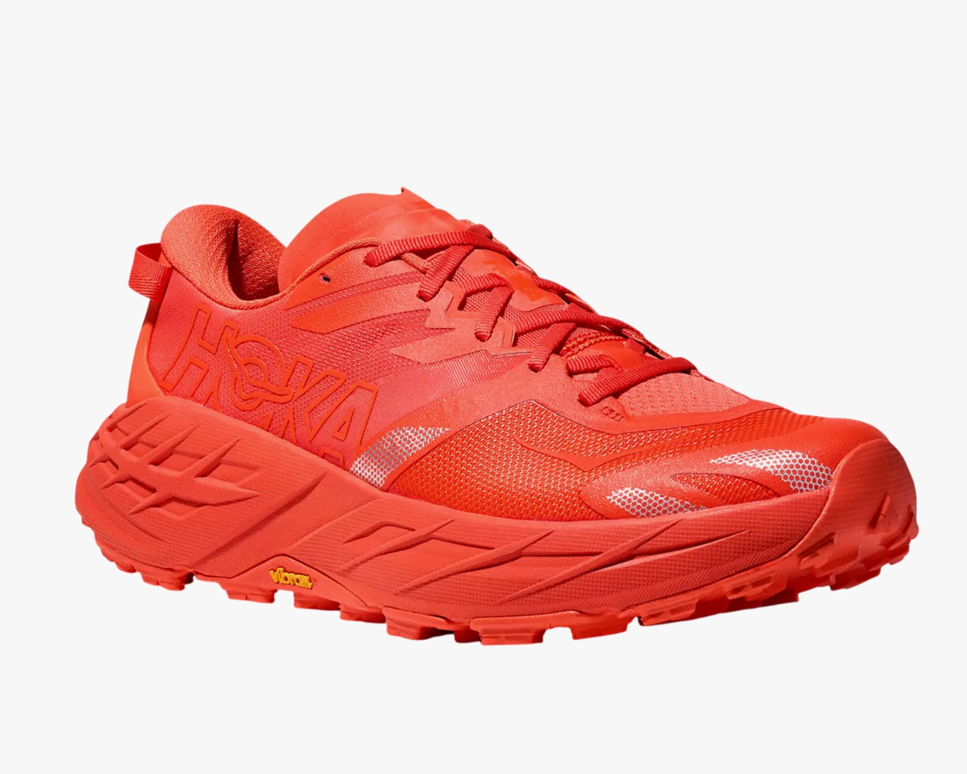 Bright red Hoka running shoe with thick sole and Vibram logo on the side.