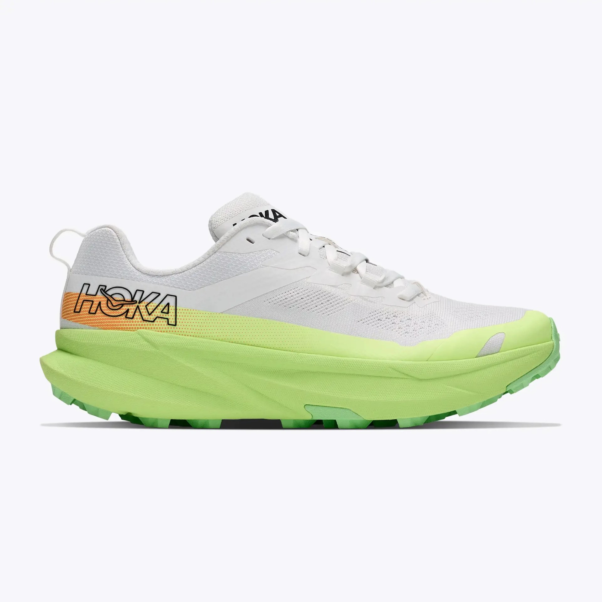 White and neon green Hoka running shoe with orange and yellow gradient detail on the heel.