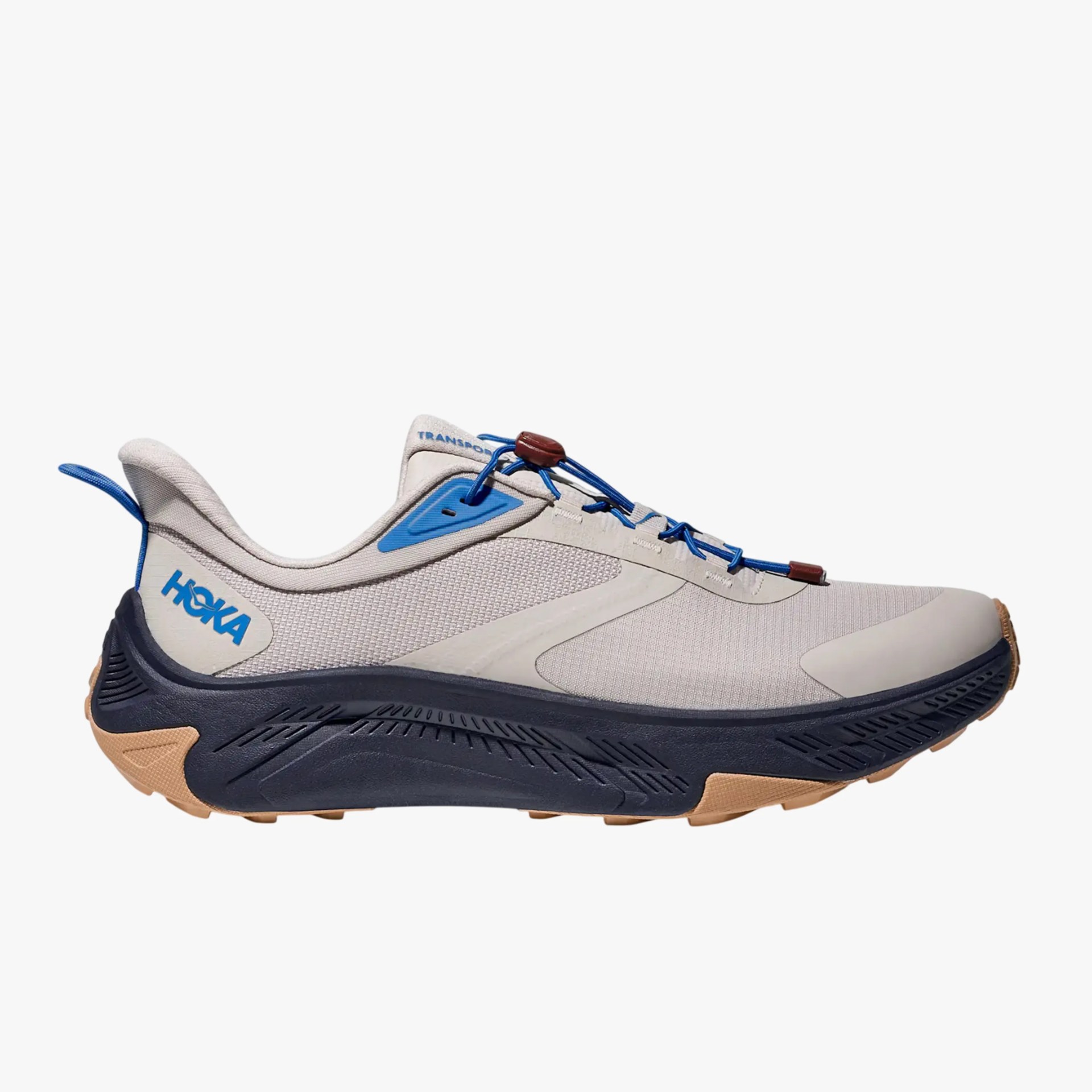 Light gray Hoka running shoe with blue accents, black midsole, and tan outsole.