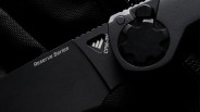 Close-up of a black folding knife blade with "Reserve Series" and "CPM-3V" markings near the pivot.