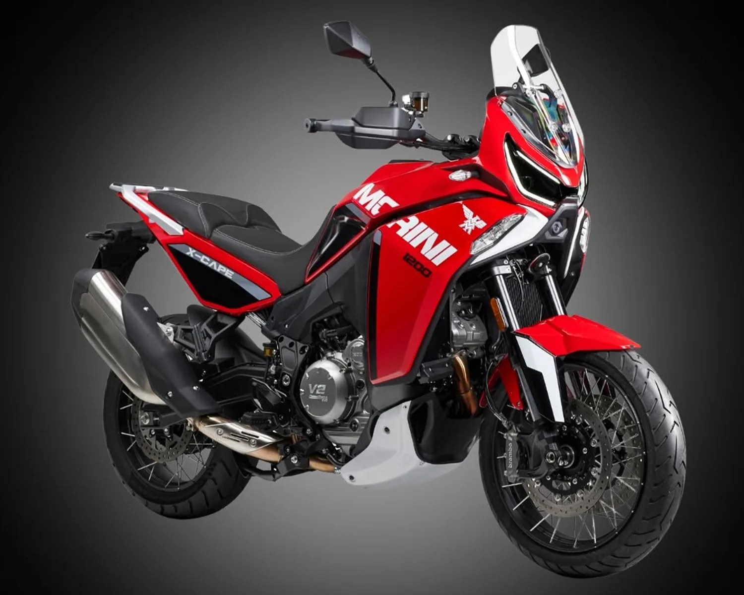 Red and black Moto Morini X-Cape 1200 adventure motorcycle with windshield on gray background.