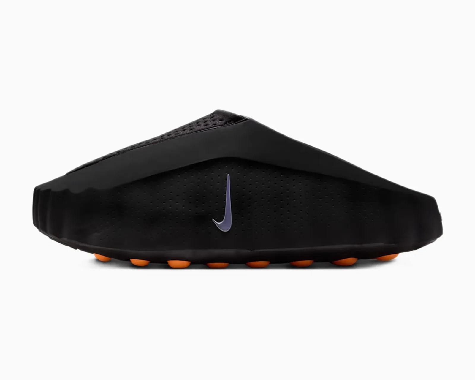 Black slip-on Nike shoe with perforated upper, purple swoosh logo, and orange sole pods.