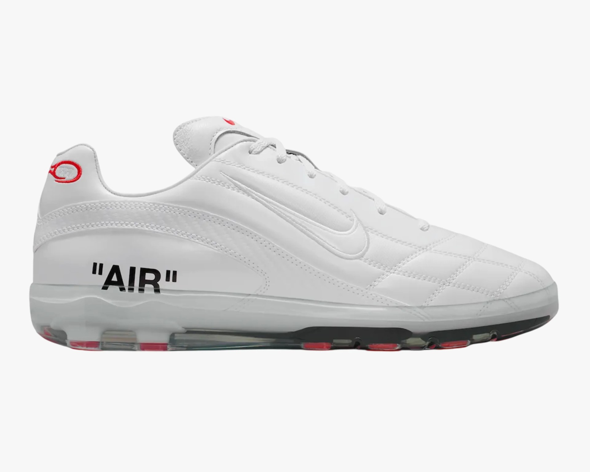 White Nike Air Max sneaker with red accents, black "AIR" text on heel, and visible air sole unit.