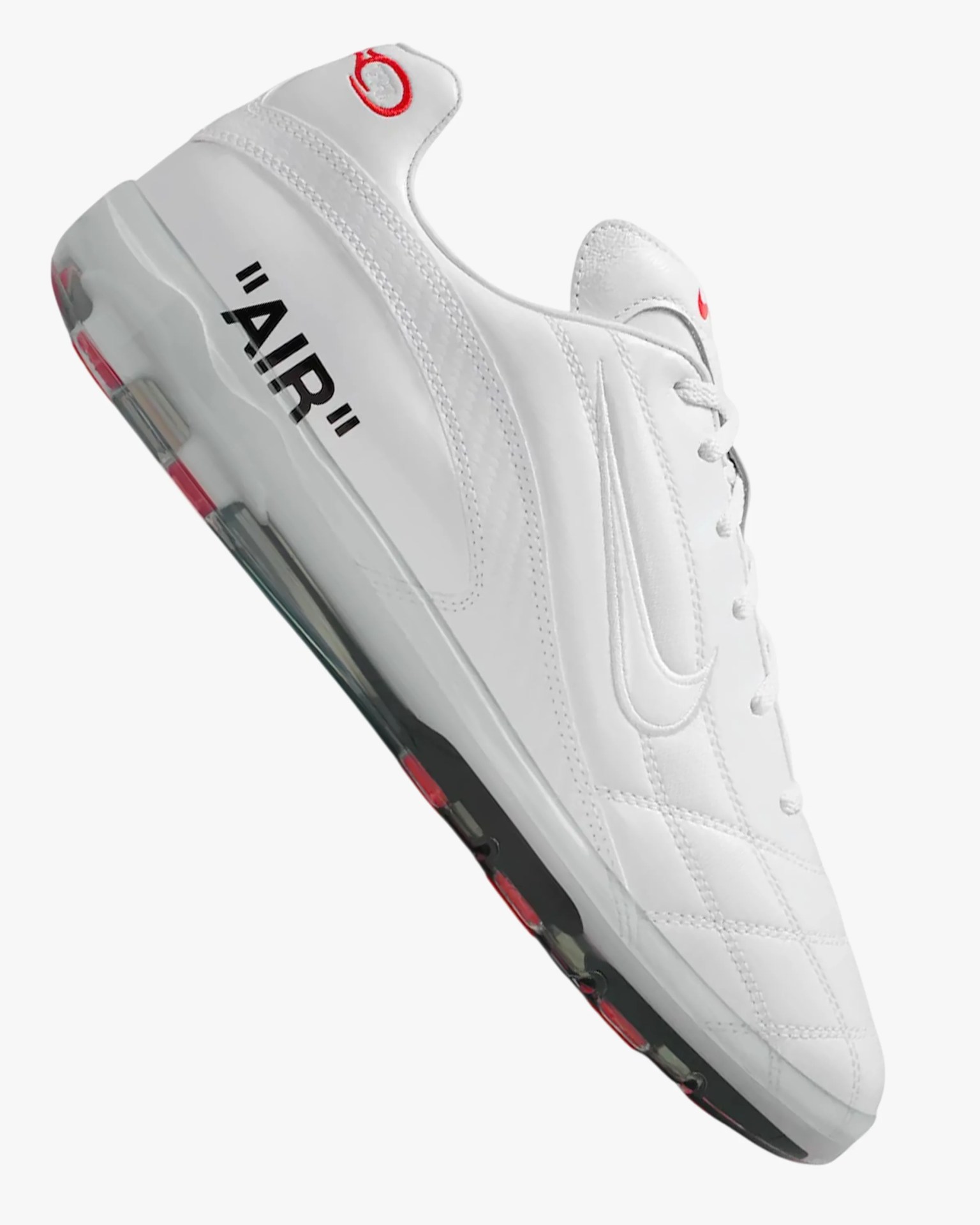 White Nike Air Max sneaker with black "AIR" text on the midsole and red accents on the tongue and heel.