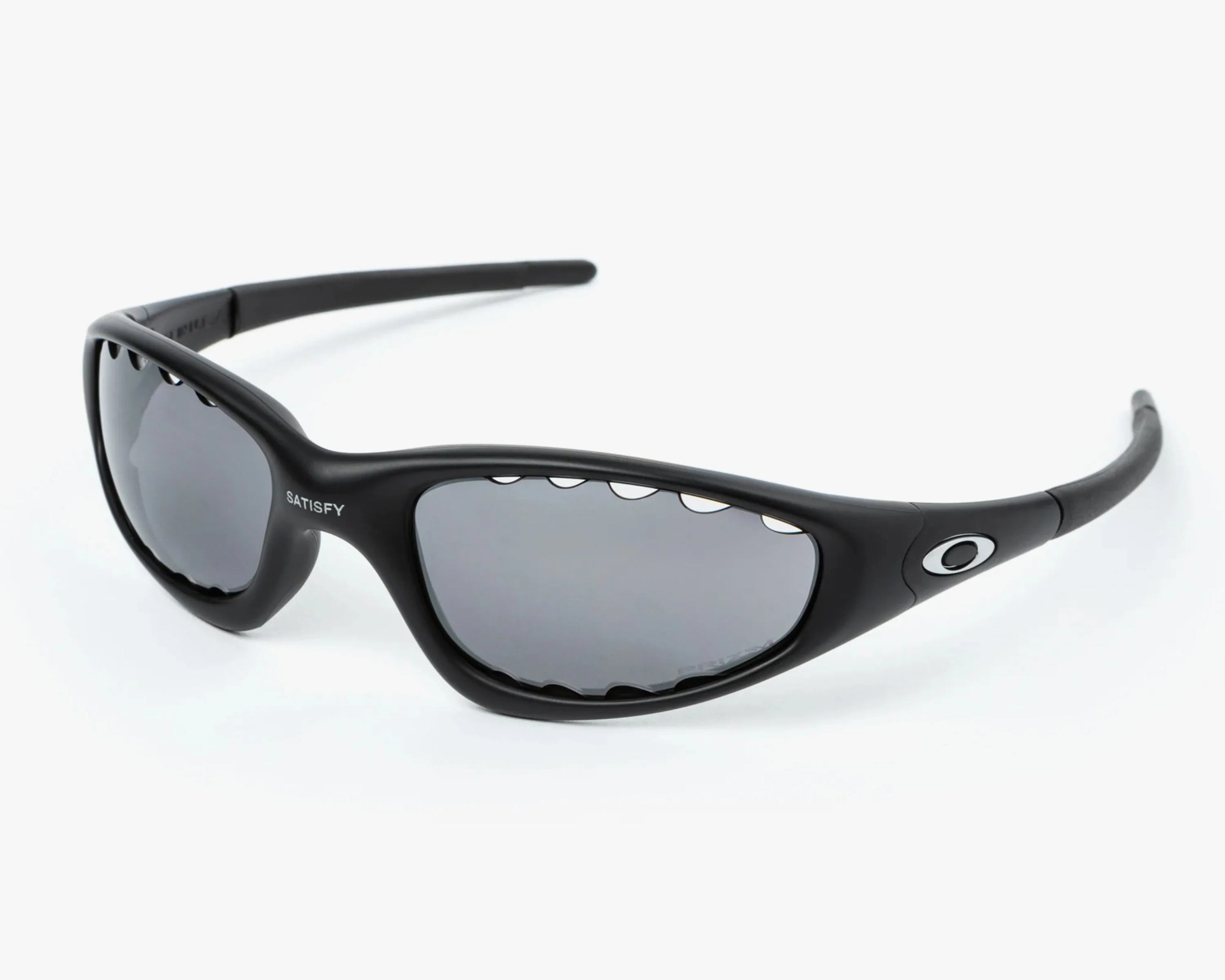 Black wraparound sunglasses with dark lenses and ventilation holes along the top edge of the frame.