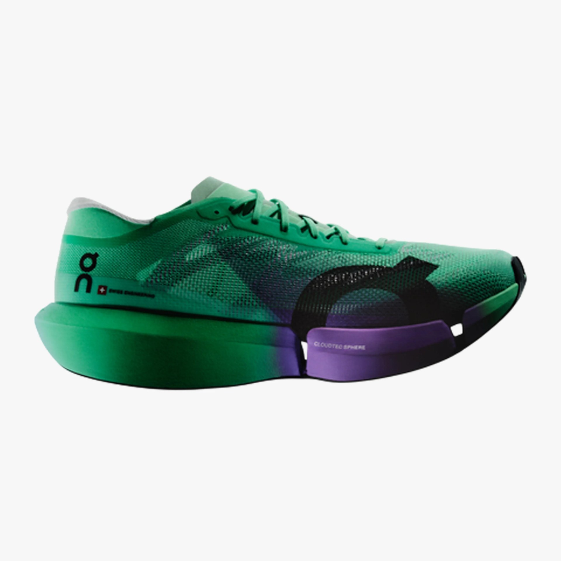 Green and purple On running shoe with mesh upper and cushioned sole.