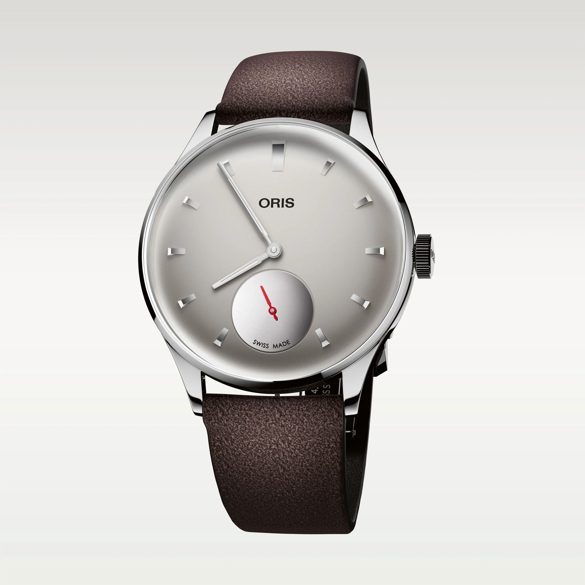 Silver Oris wristwatch with a minimalist dial, brown leather strap, and red second hand on a subdial.