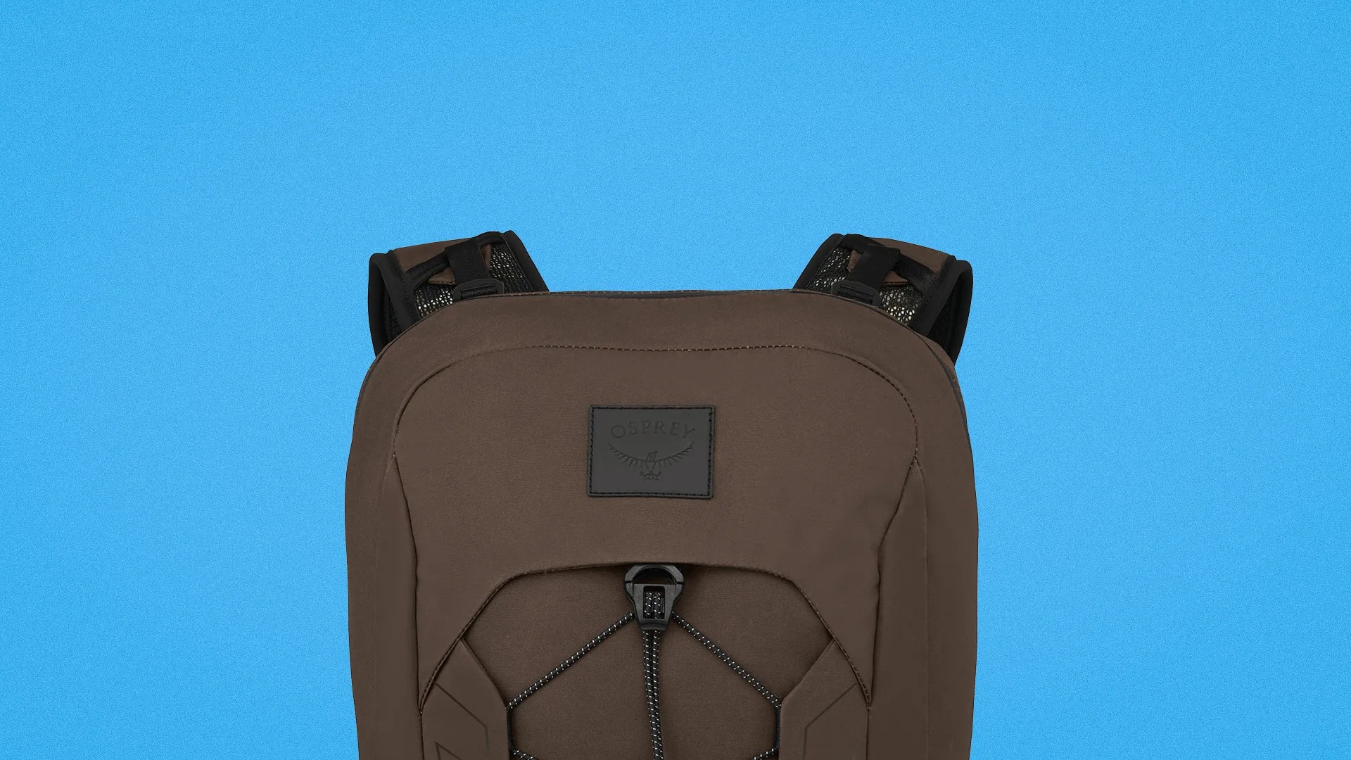 Brown Osprey backpack with black adjustable straps and front bungee cord on blue background.