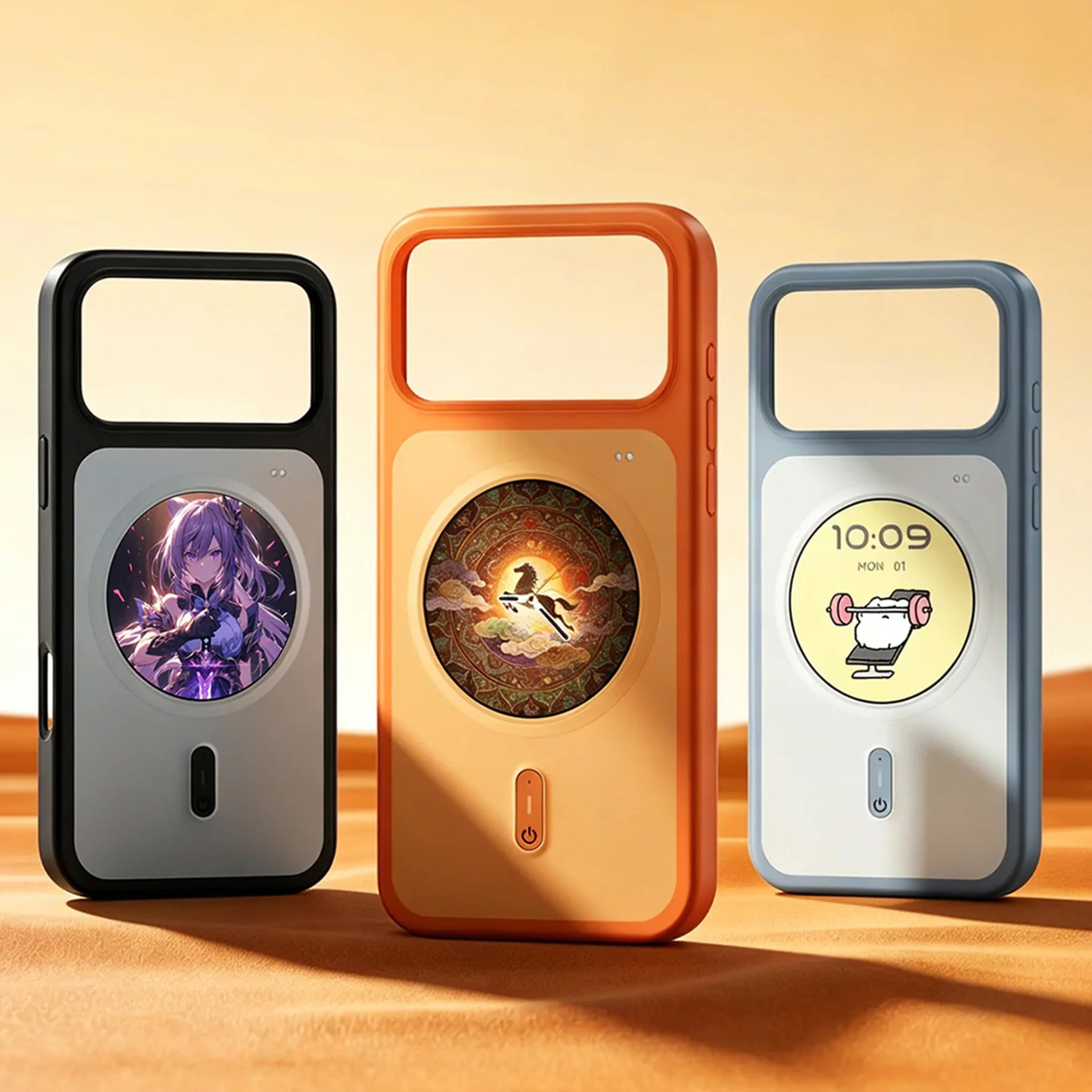 Three rectangular electronic devices in black, orange, and blue with circular screens displaying different images, standing on an orange surface.