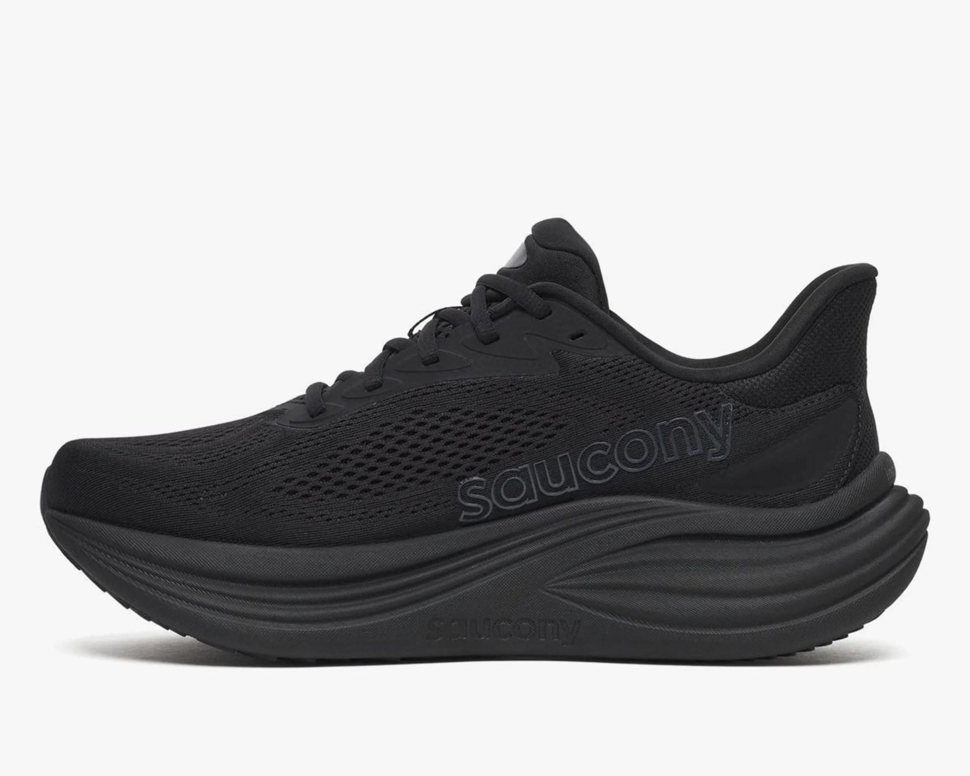 Black Saucony running shoe with mesh upper and thick cushioned sole.
