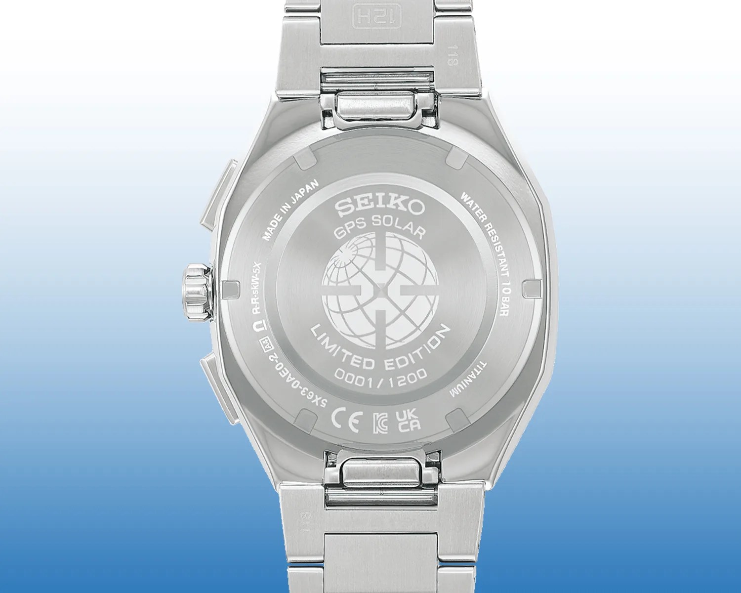 Back of a silver Seiko GPS Solar limited edition watch with titanium case and metal bracelet.
