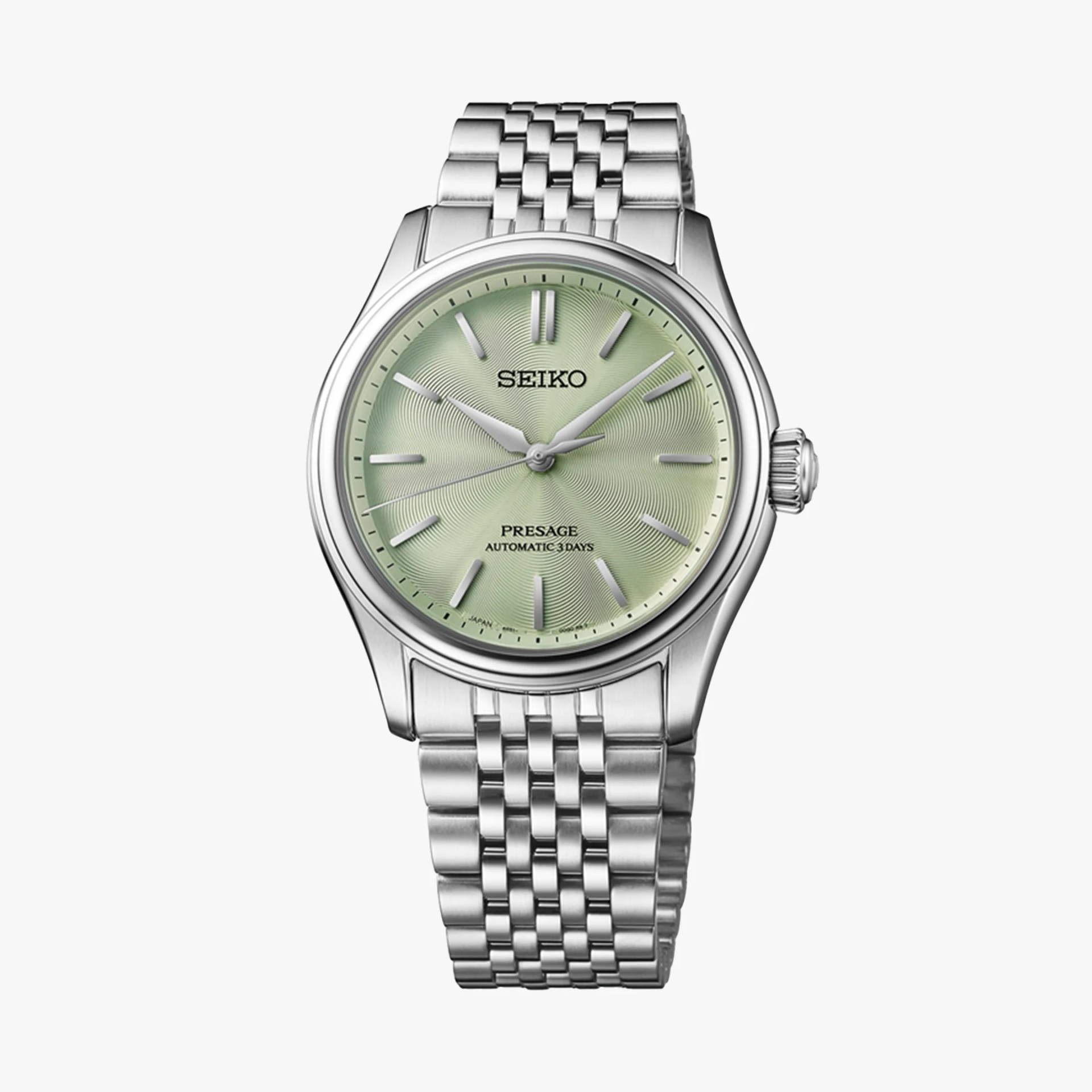 Silver stainless steel Seiko Presage watch with light green textured dial and metal link bracelet.