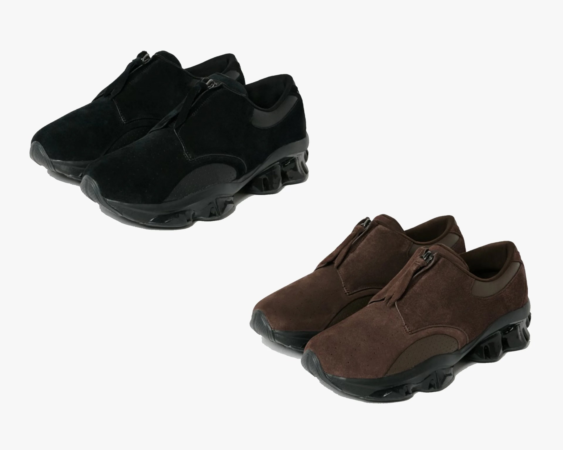 Pair of black suede sneakers with chunky soles and zippers, next to a pair of brown suede sneakers with similar design.