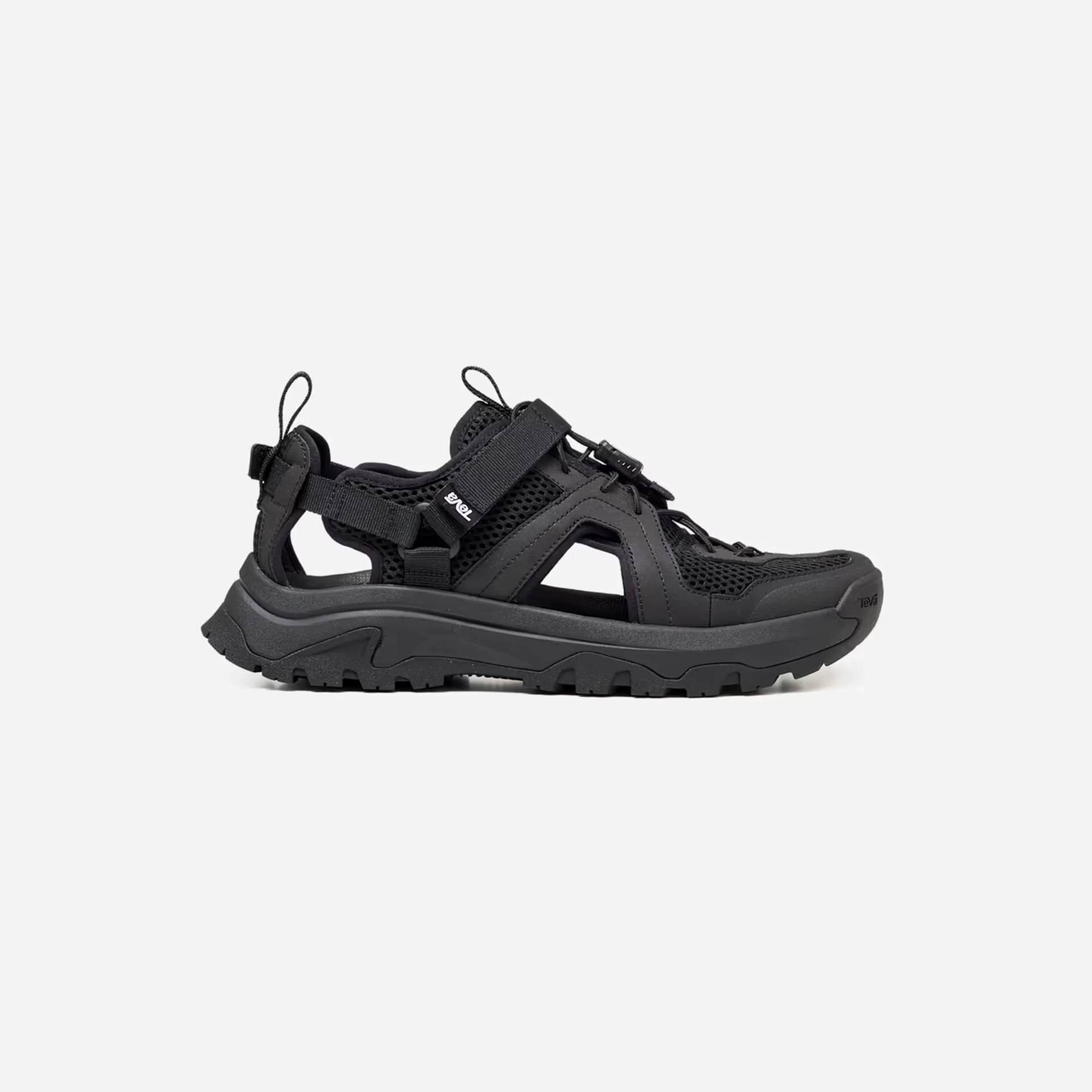 Black outdoor sandal with mesh upper, adjustable straps, and rugged sole on a white background.