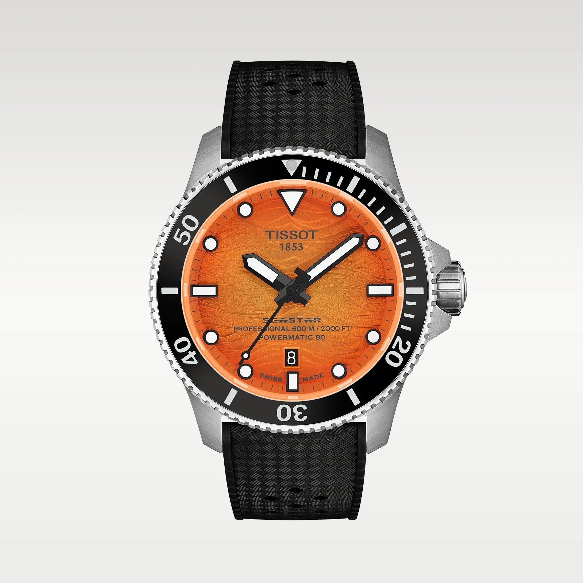 Diver watch with orange textured dial, black bezel, silver case, and black textured rubber strap.