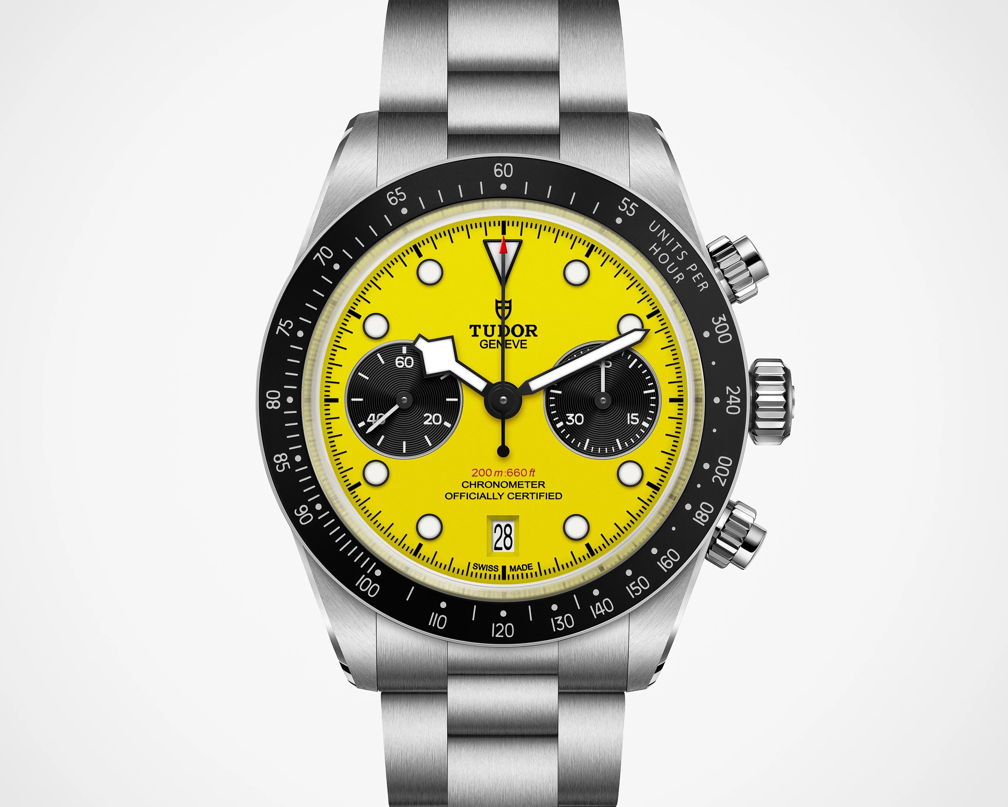 Stainless steel Tudor chronograph watch with bright yellow dial, black subdials, and black bezel with tachymeter scale.