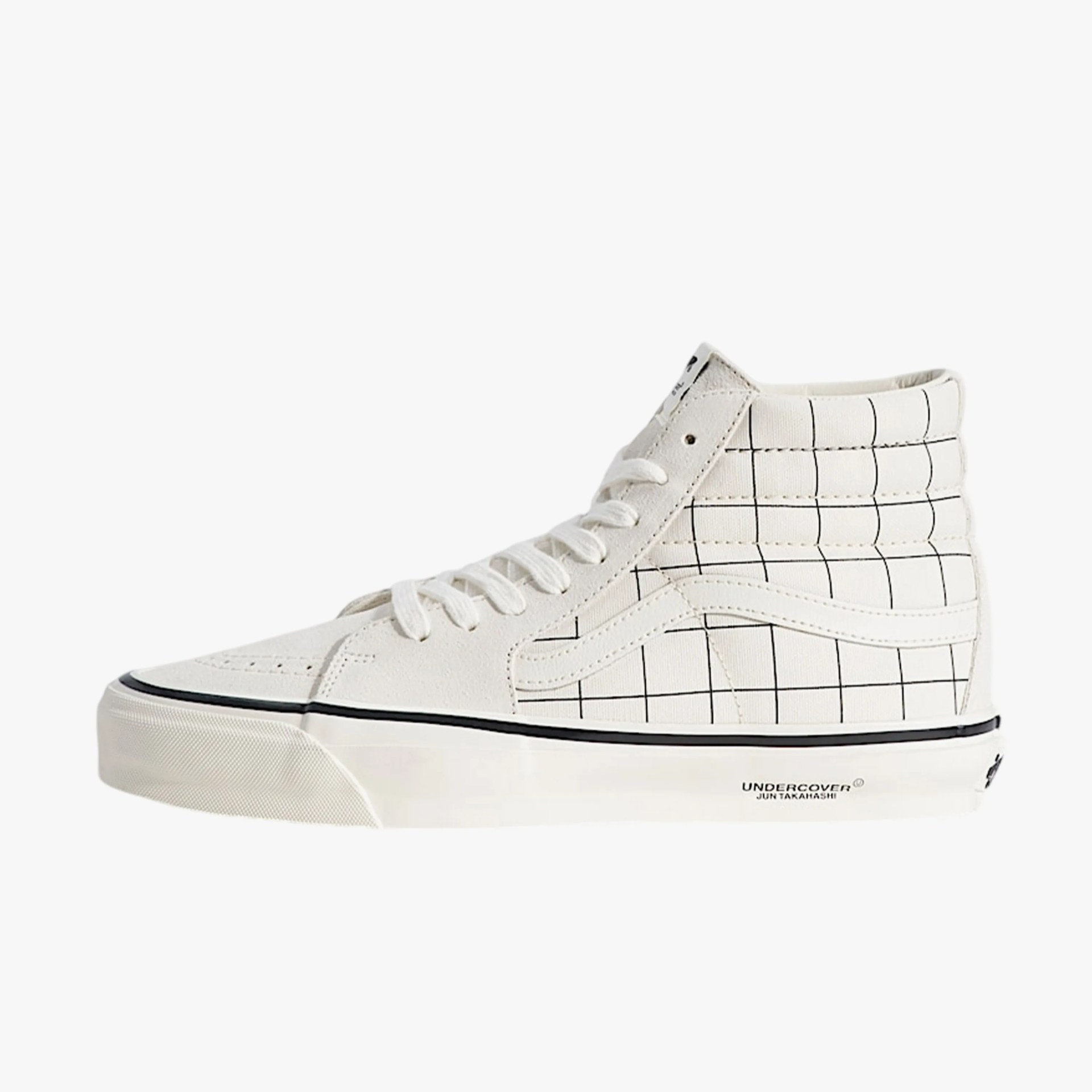 White high-top sneaker with black grid pattern and "UNDERCOVER JUN TAKAHASHI" text on the sole.