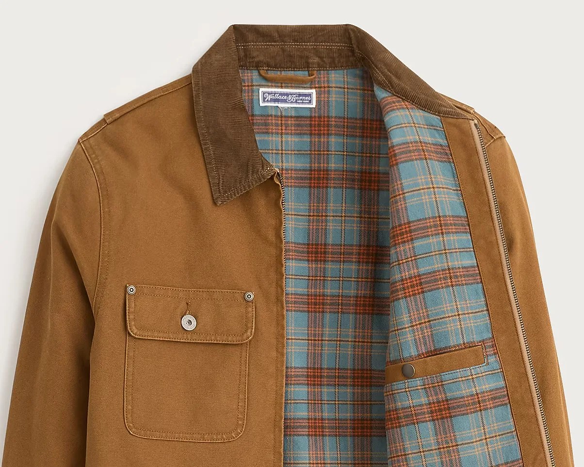 Brown canvas jacket with corduroy collar and blue and orange plaid flannel lining.