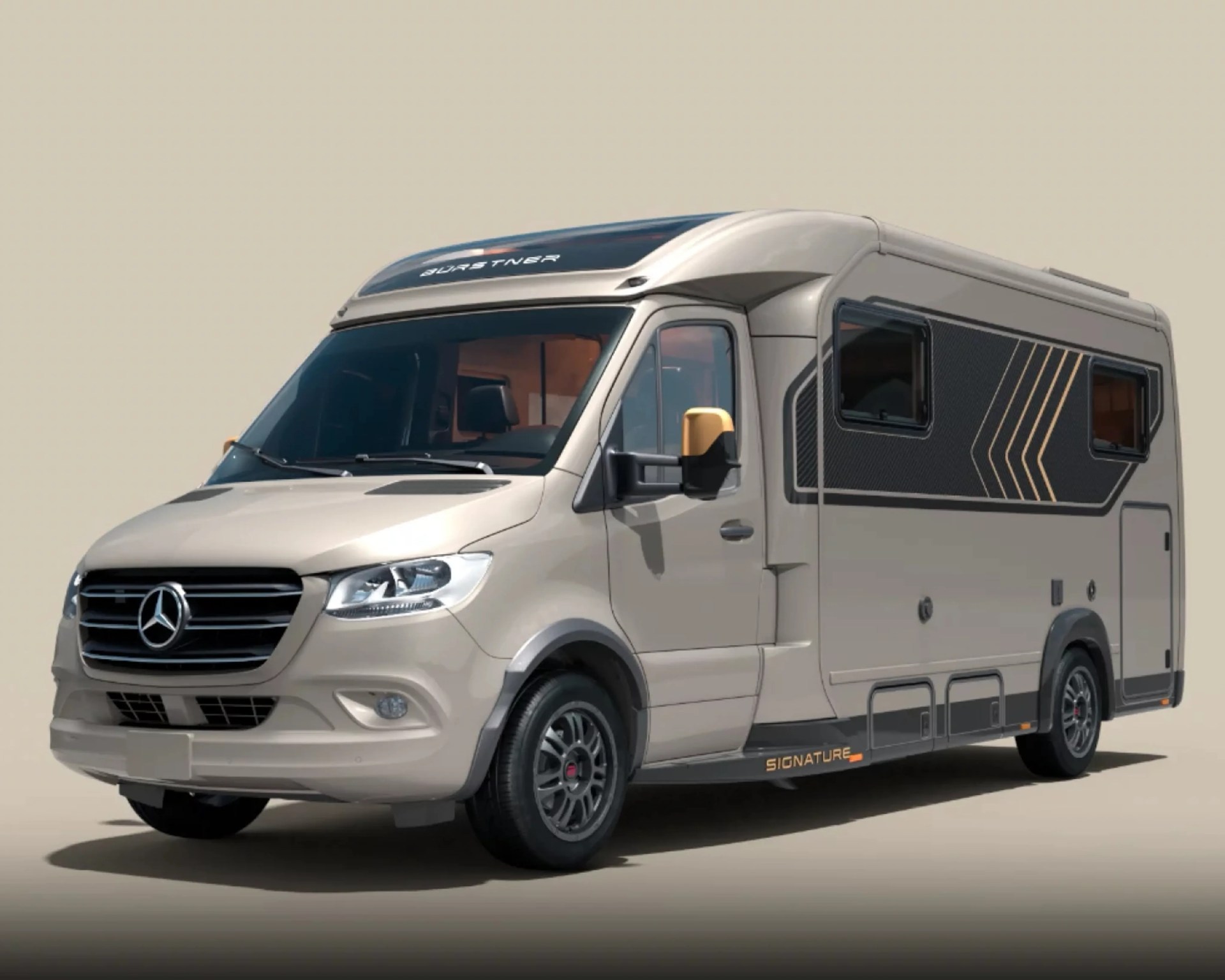 Beige Mercedes-Benz camper van with black and gold side panel graphics and tinted windows.