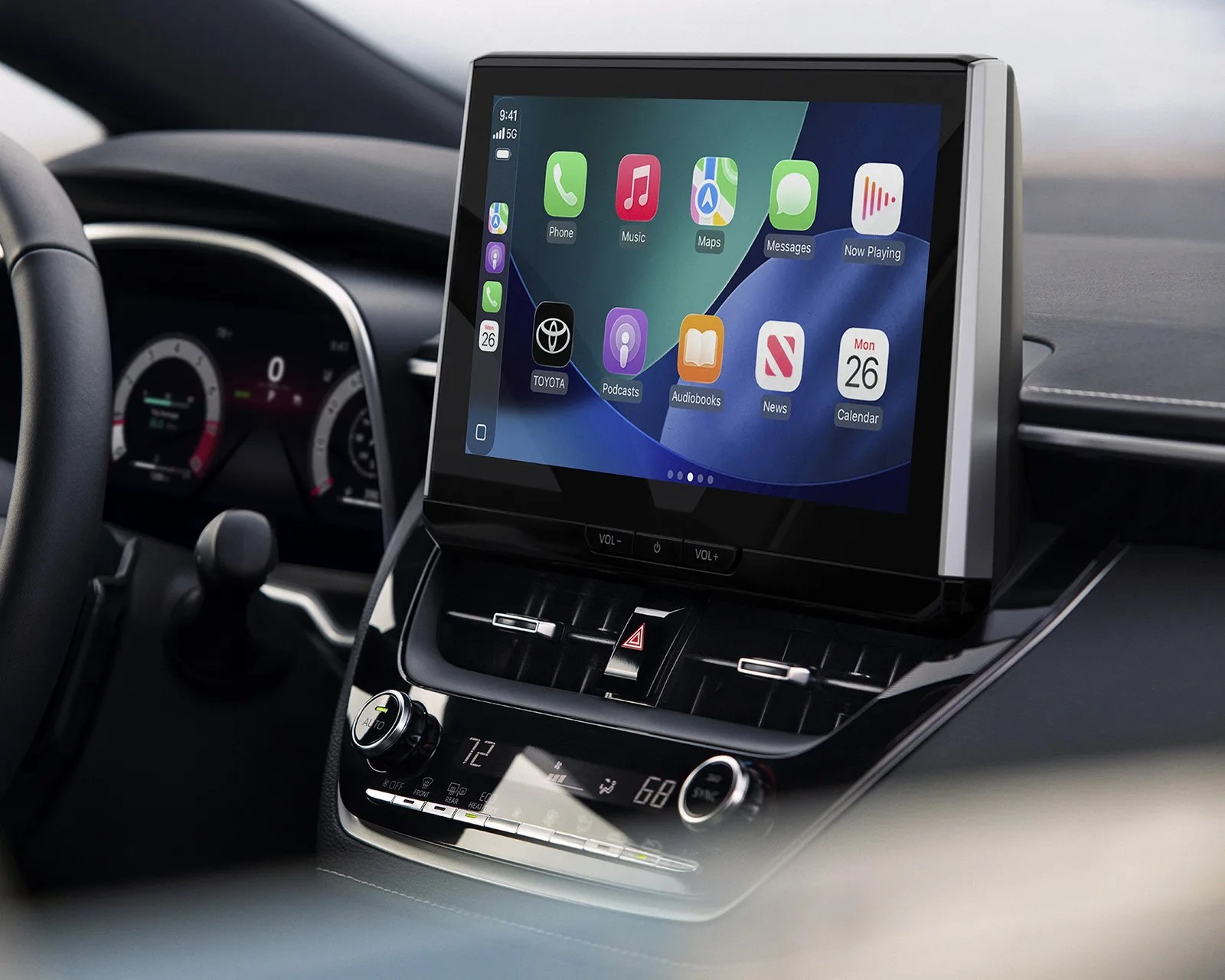 Car dashboard touchscreen display showing Apple CarPlay interface with apps like Phone, Music, Maps, and Messages.