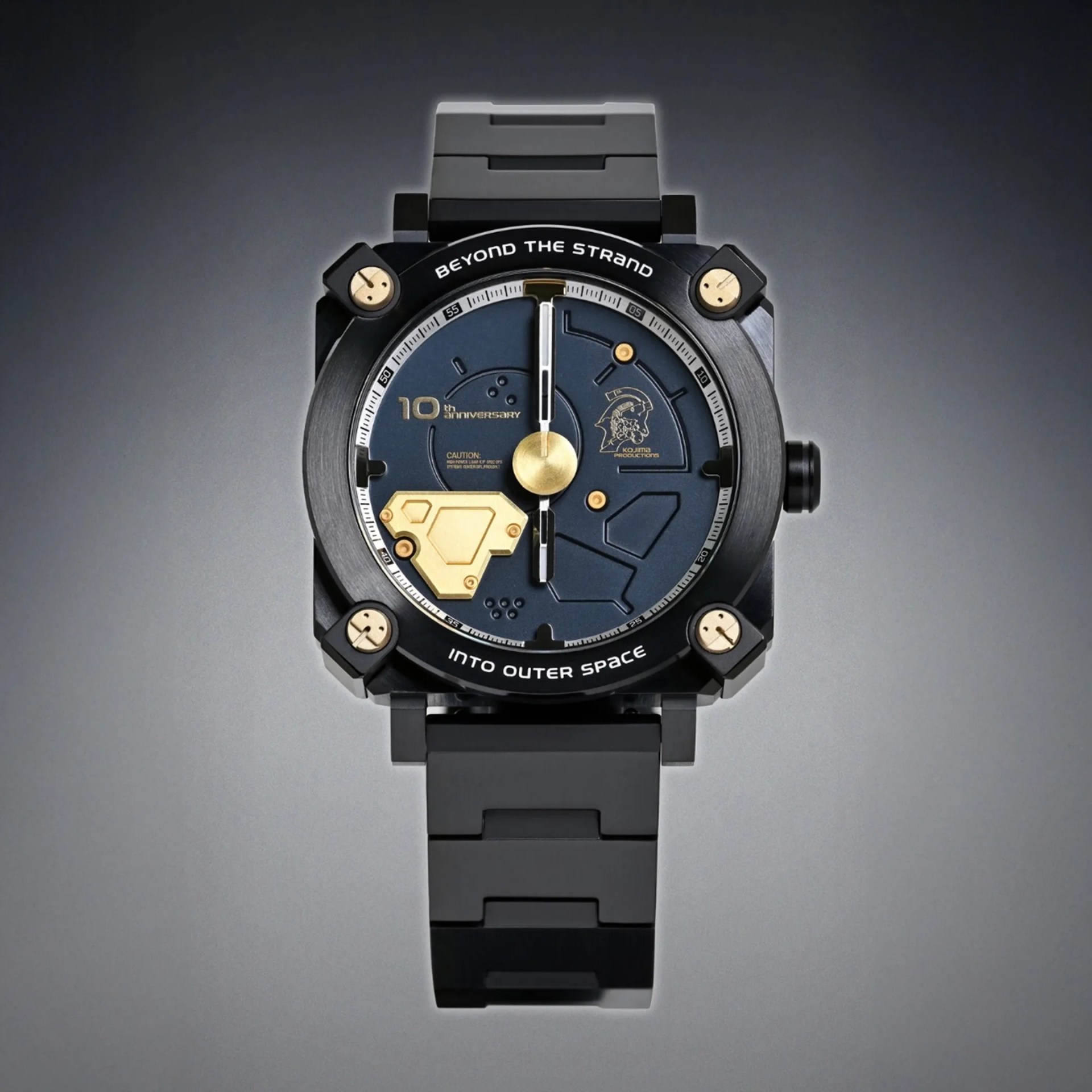 Black wristwatch with a square face featuring gold accents and the text "Beyond the Strand" and "Into Outer Space.