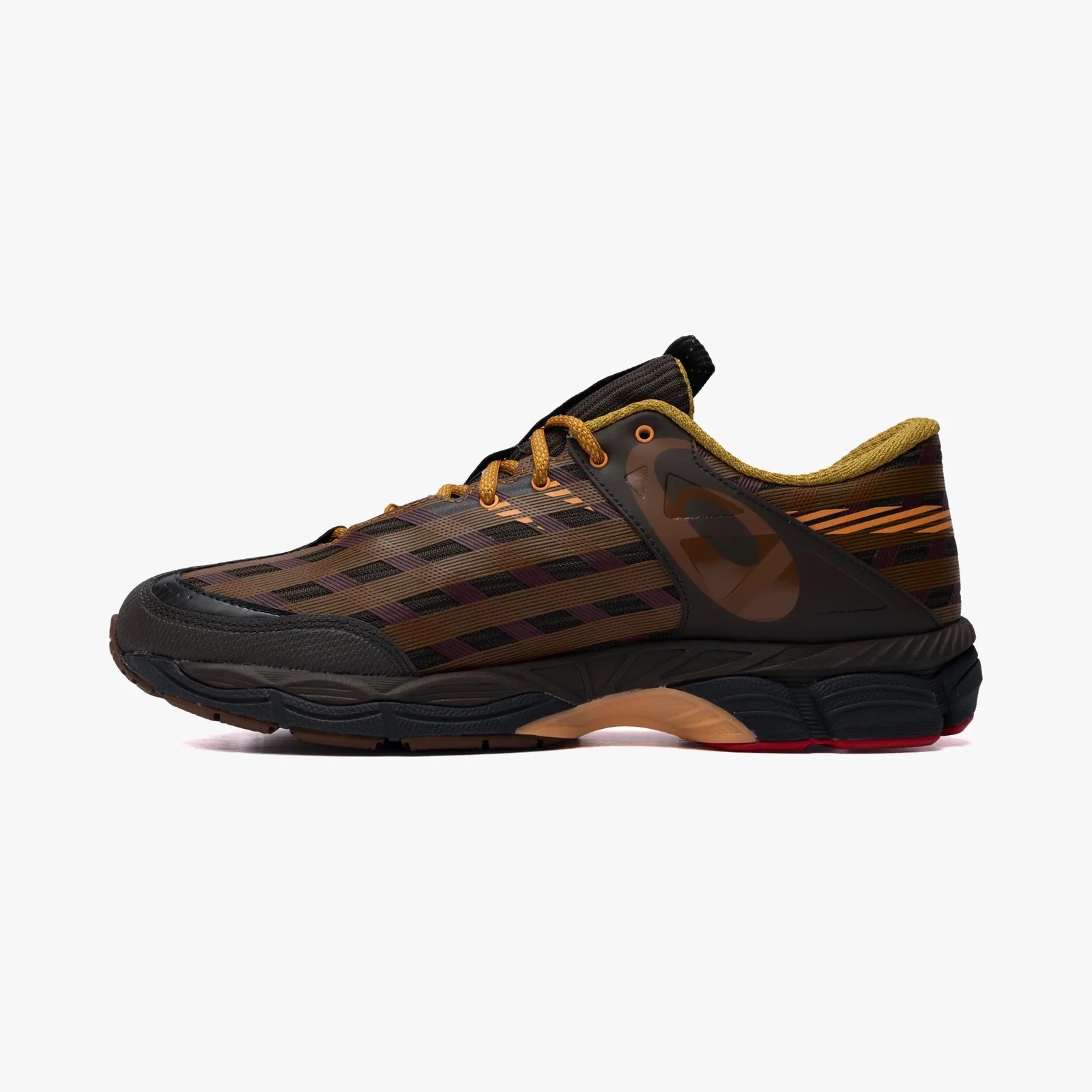 Brown and black athletic shoe with orange laces and a textured sole.