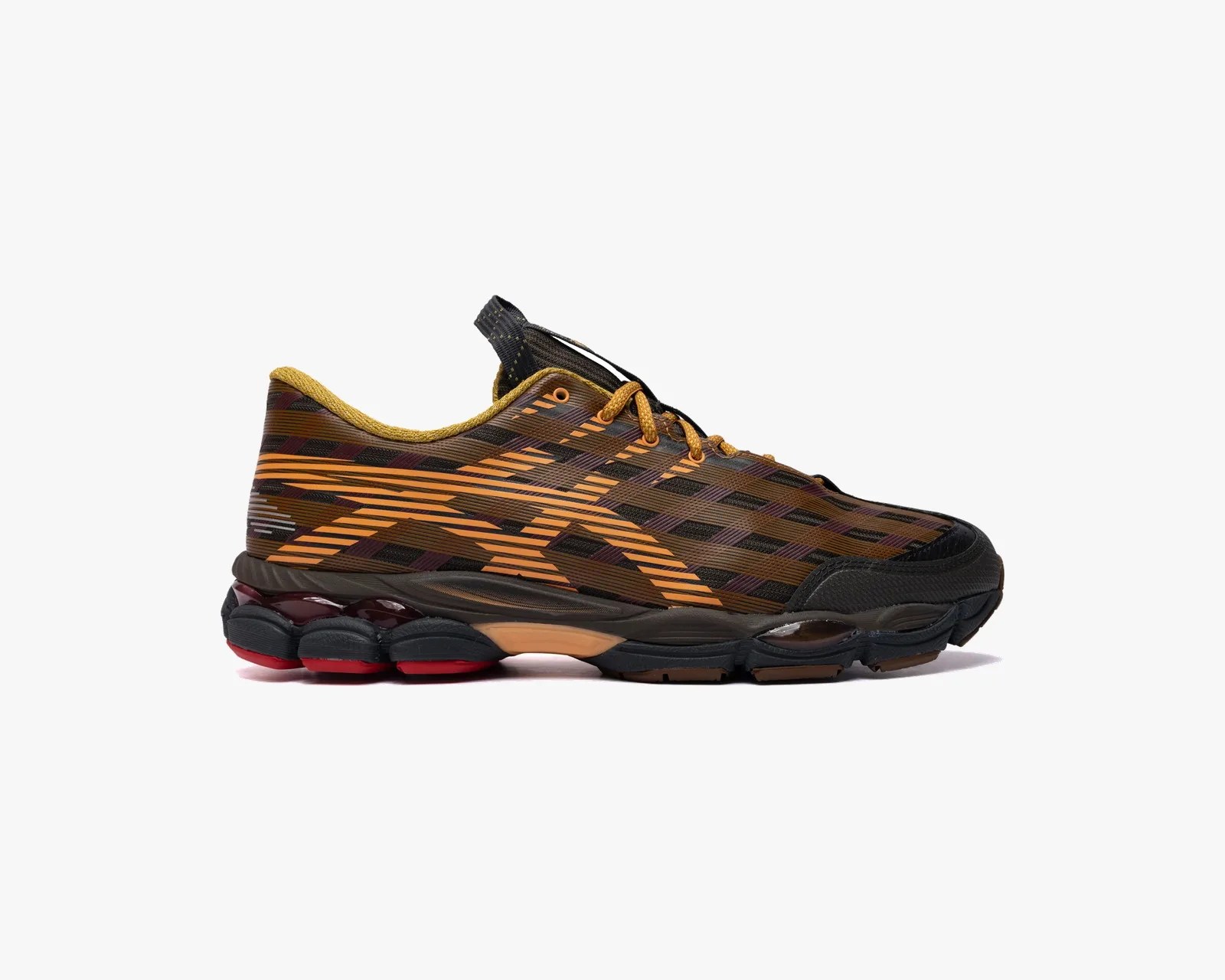Brown and orange patterned Asics sneaker with black and red cushioned sole.