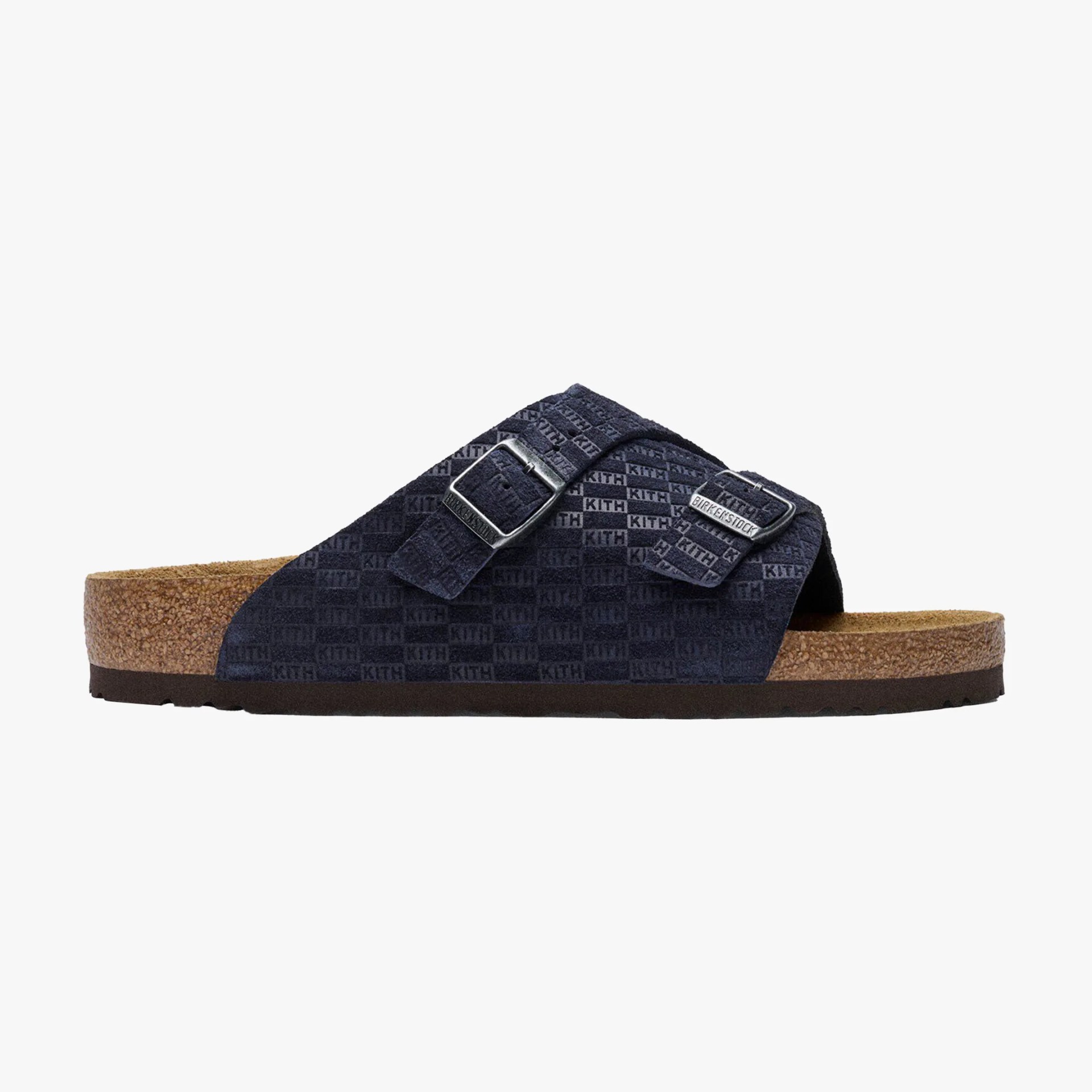 Navy blue Birkenstock sandal with double adjustable straps featuring KITH logo pattern and cork footbed.