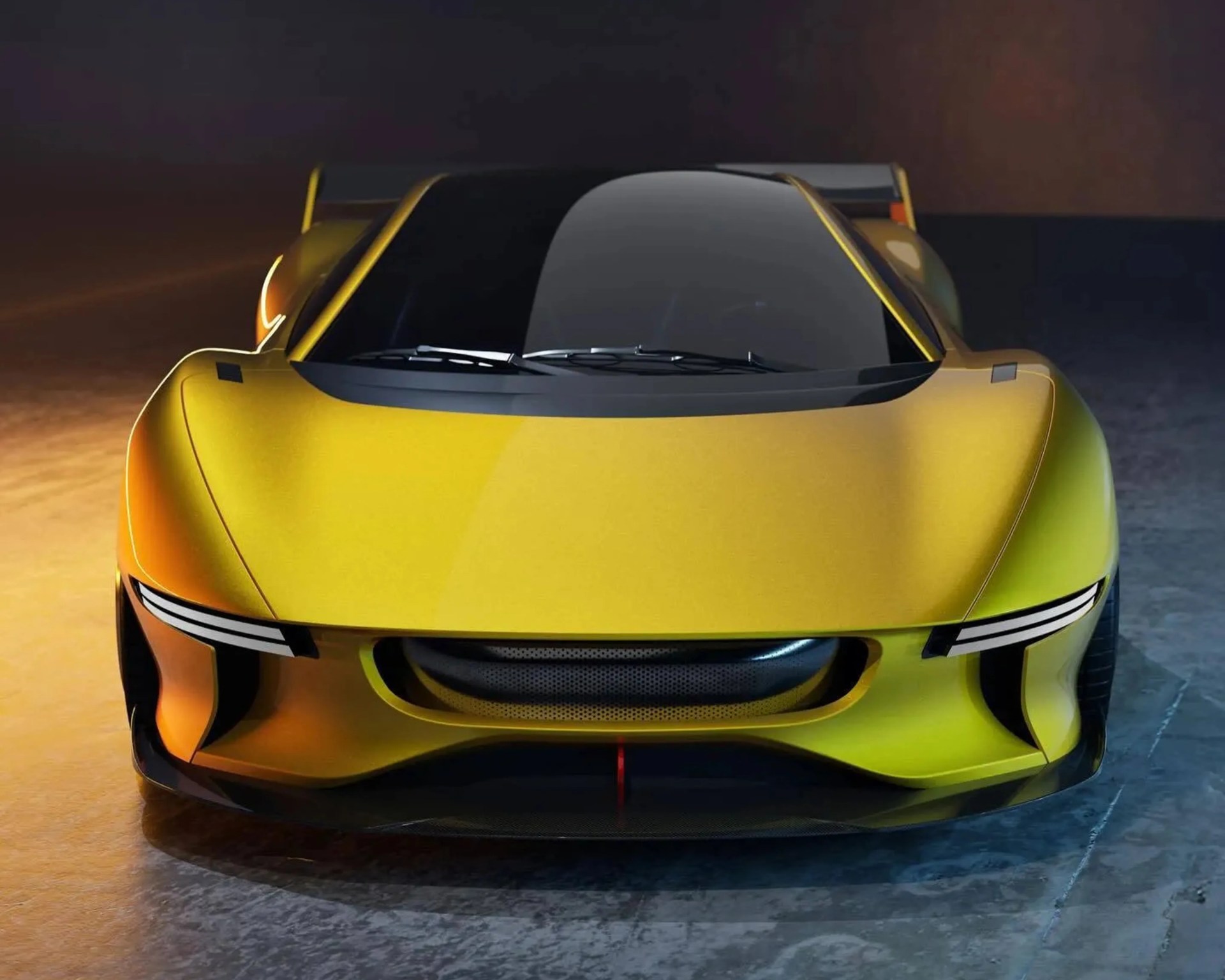 Yellow sports car front with sleek headlights and large black grille on a textured floor.