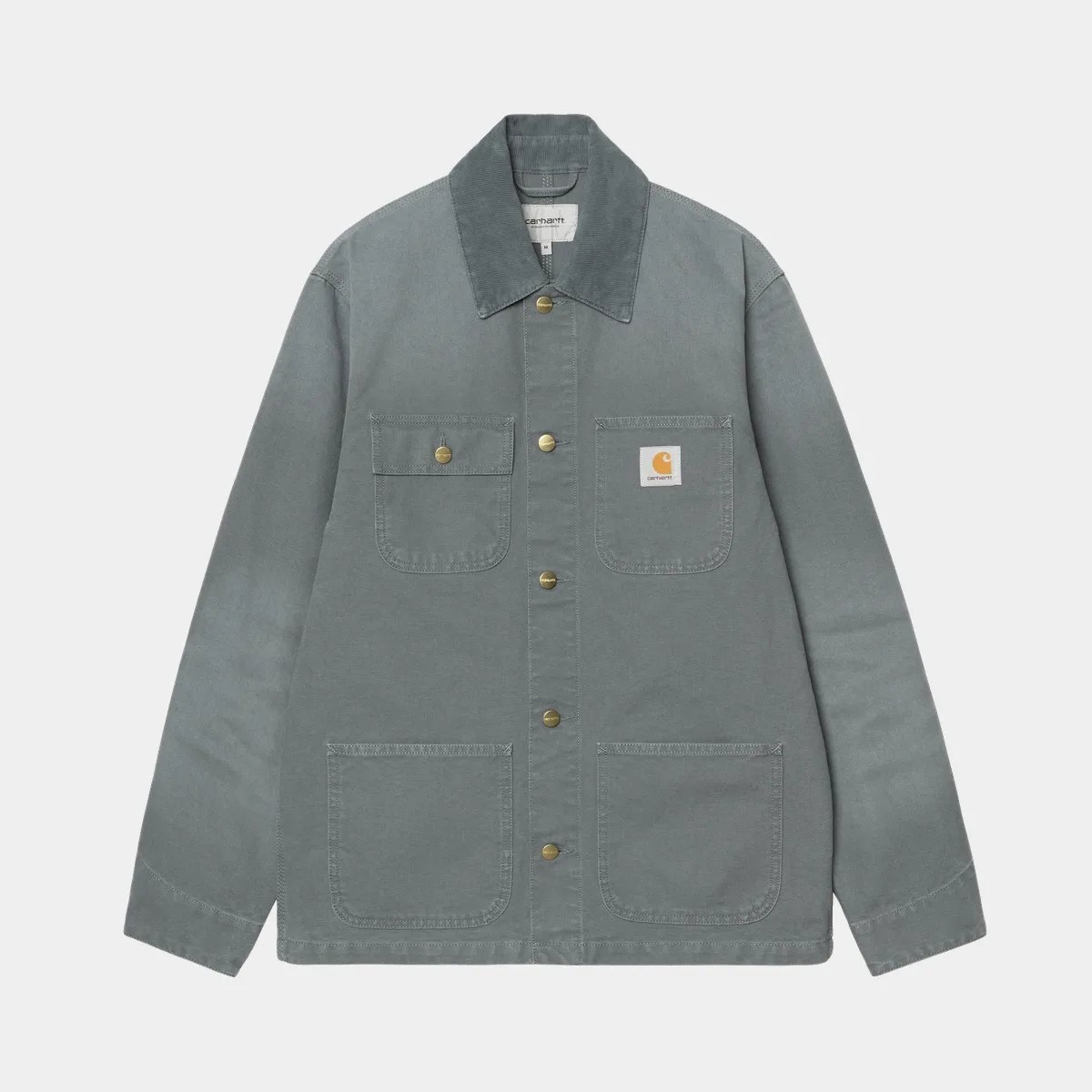 Gray-green Carhartt chore jacket with four front pockets and brass snap buttons.