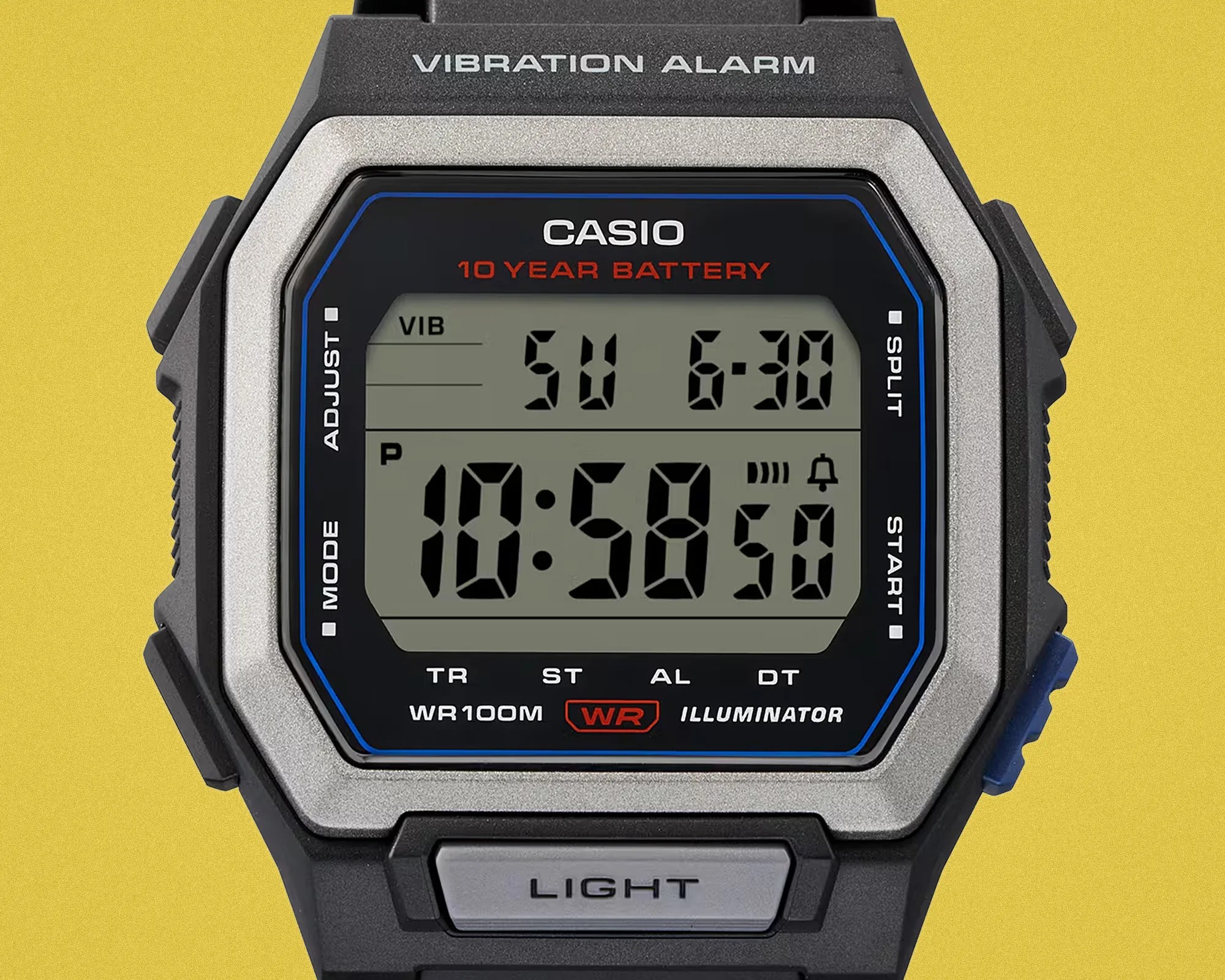 Digital Casio watch face with vibration alarm, 10-year battery, and light button on black and silver casing.