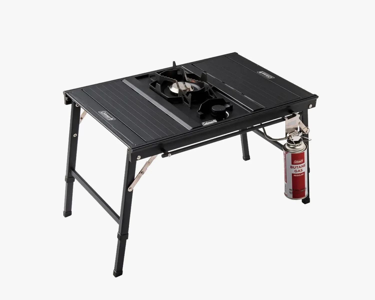 Black Coleman portable camping stove with foldable legs and attached butane gas canister.