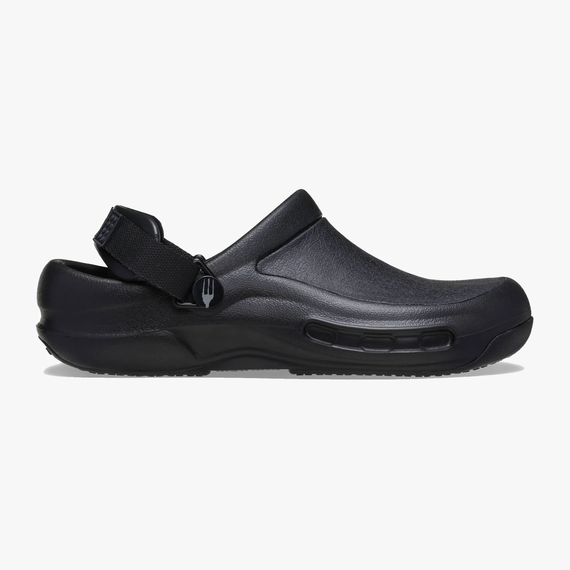 Black slip-on clog with textured surface and adjustable heel strap featuring a small round logo button.