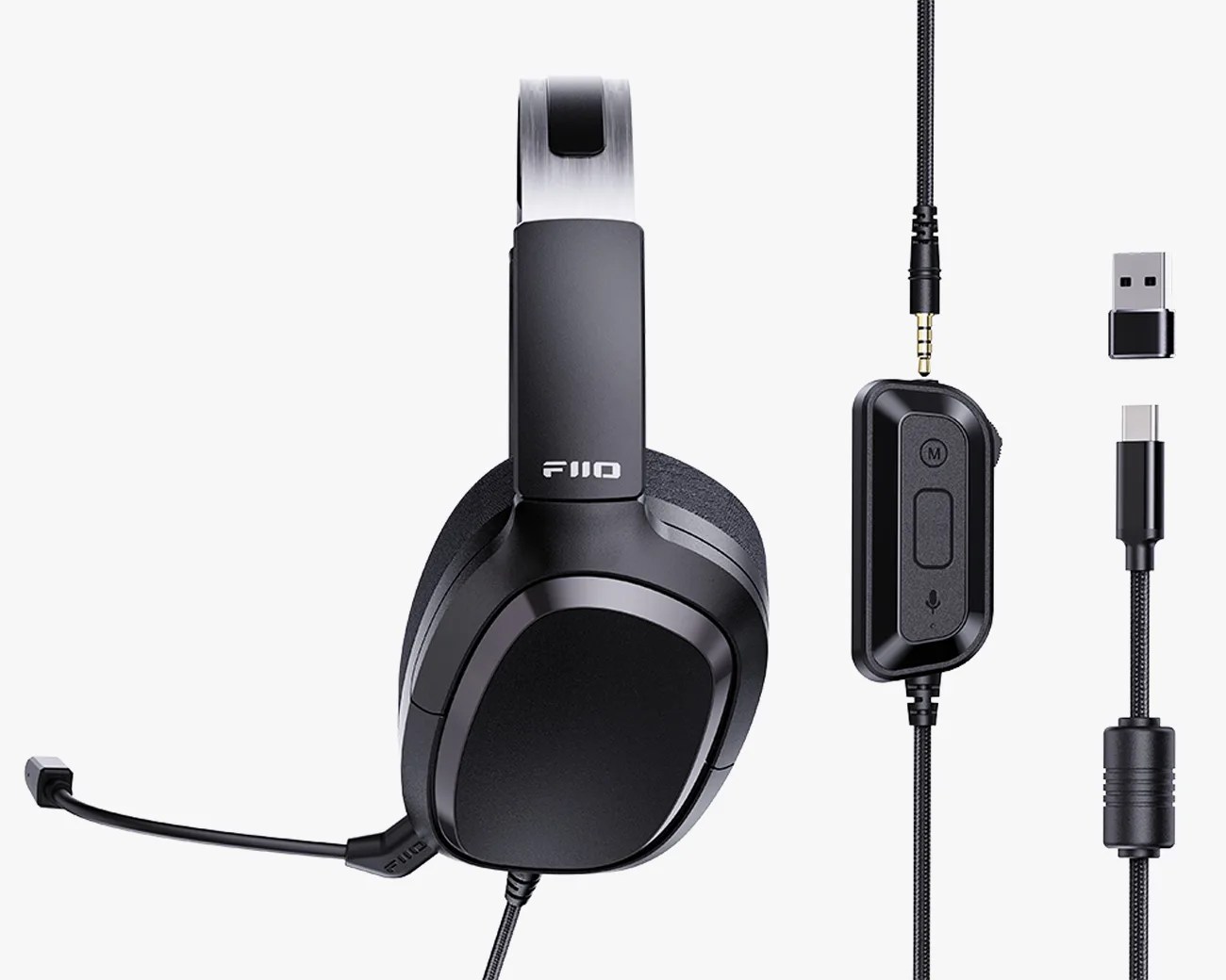 Black over-ear gaming headset with attached microphone, inline control, USB-C and USB-A connectors, and a wireless dongle.