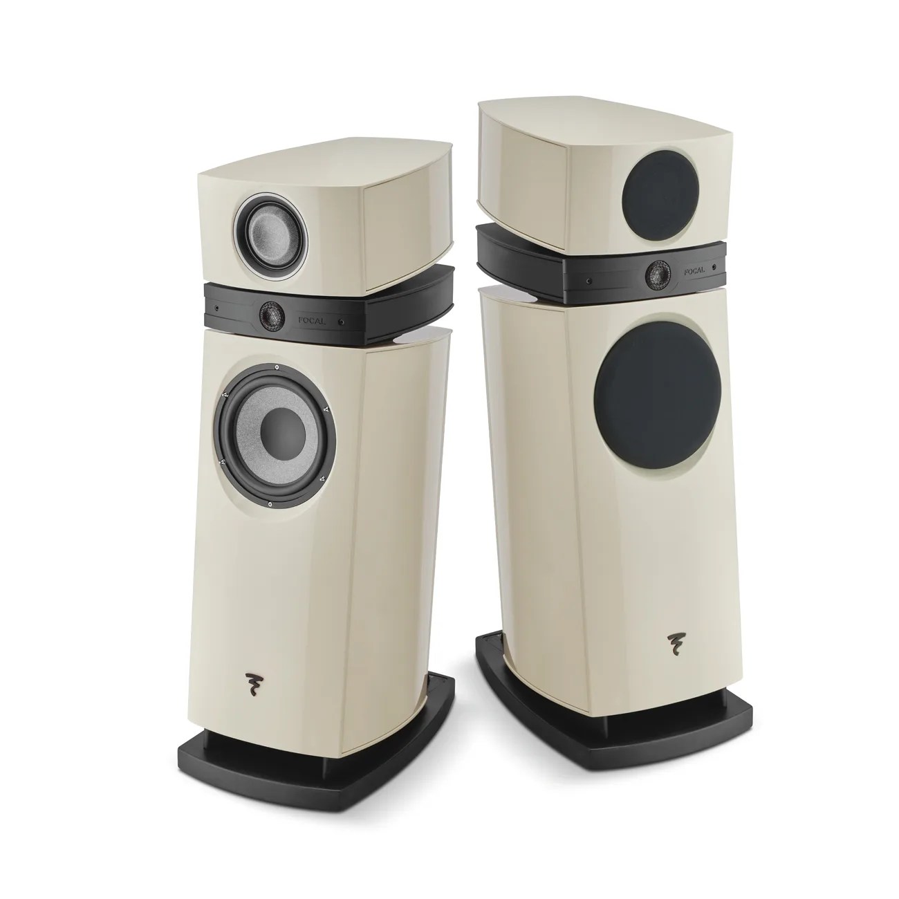 Pair of cream-colored Focal floor-standing speakers with black bases and visible drivers on a white background.