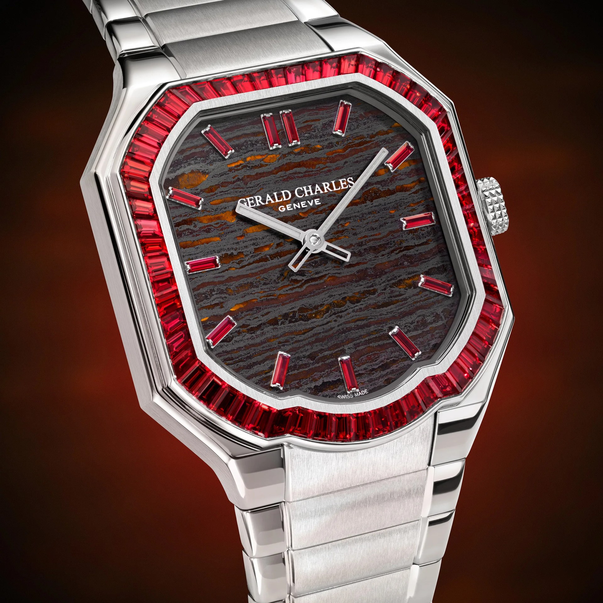 Silver Gerald Charles wristwatch with a textured dark brown dial, red gemstone hour markers, and a red gemstone bezel.