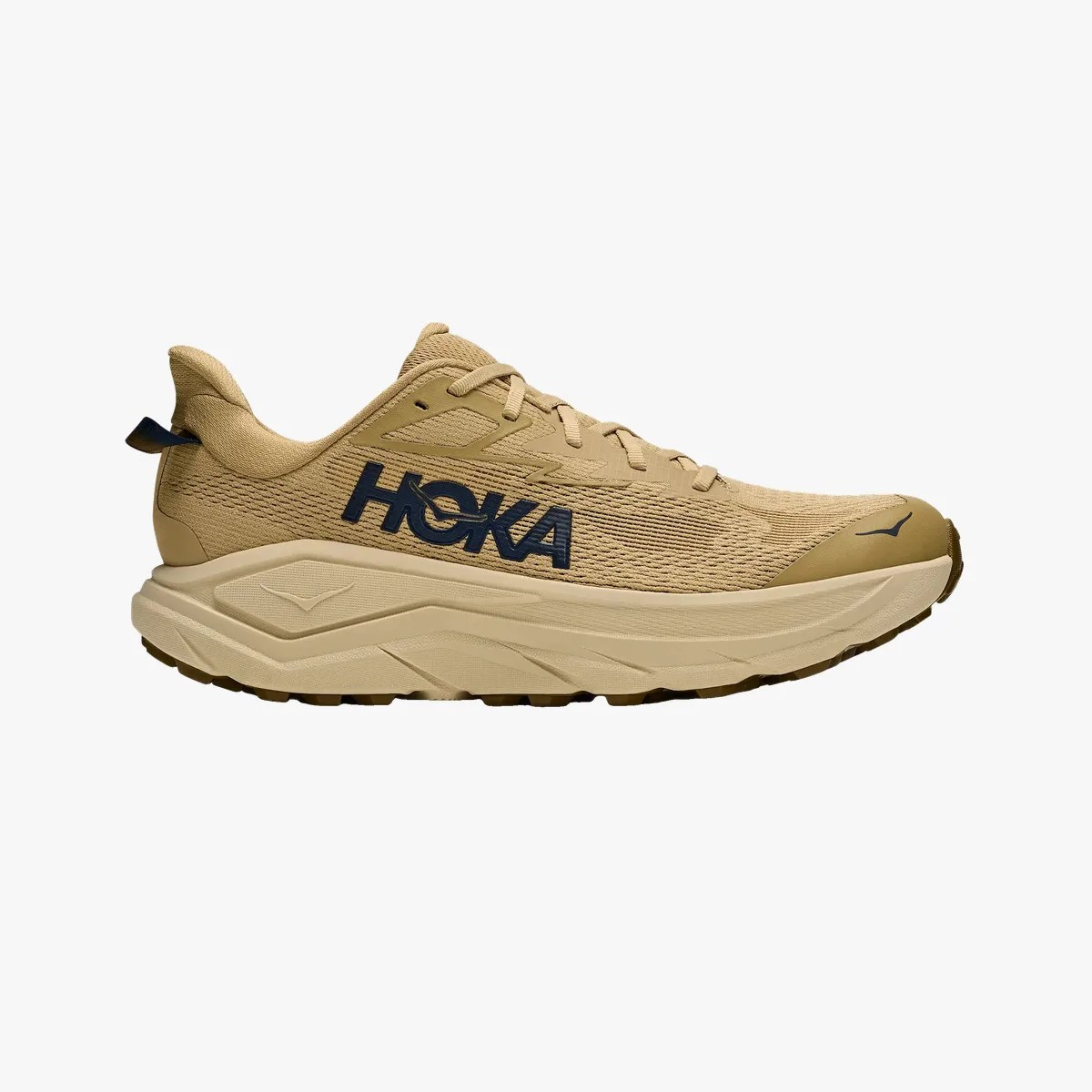Tan Hoka running shoe with black logo and thick beige sole shown from the side.