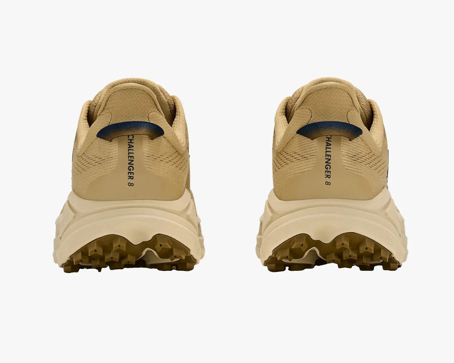 Pair of tan trail running shoes with chunky beige soles and "CHALLENGER 8" text on the heel tab.