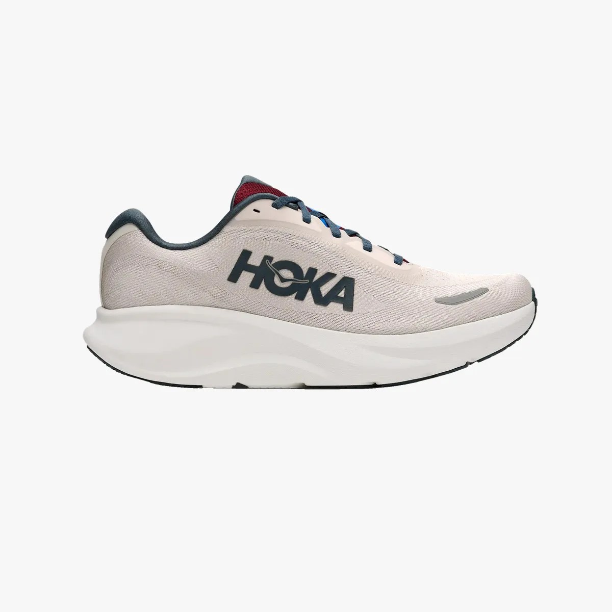 Light beige Hoka running shoe with thick white sole and dark blue logo and laces.