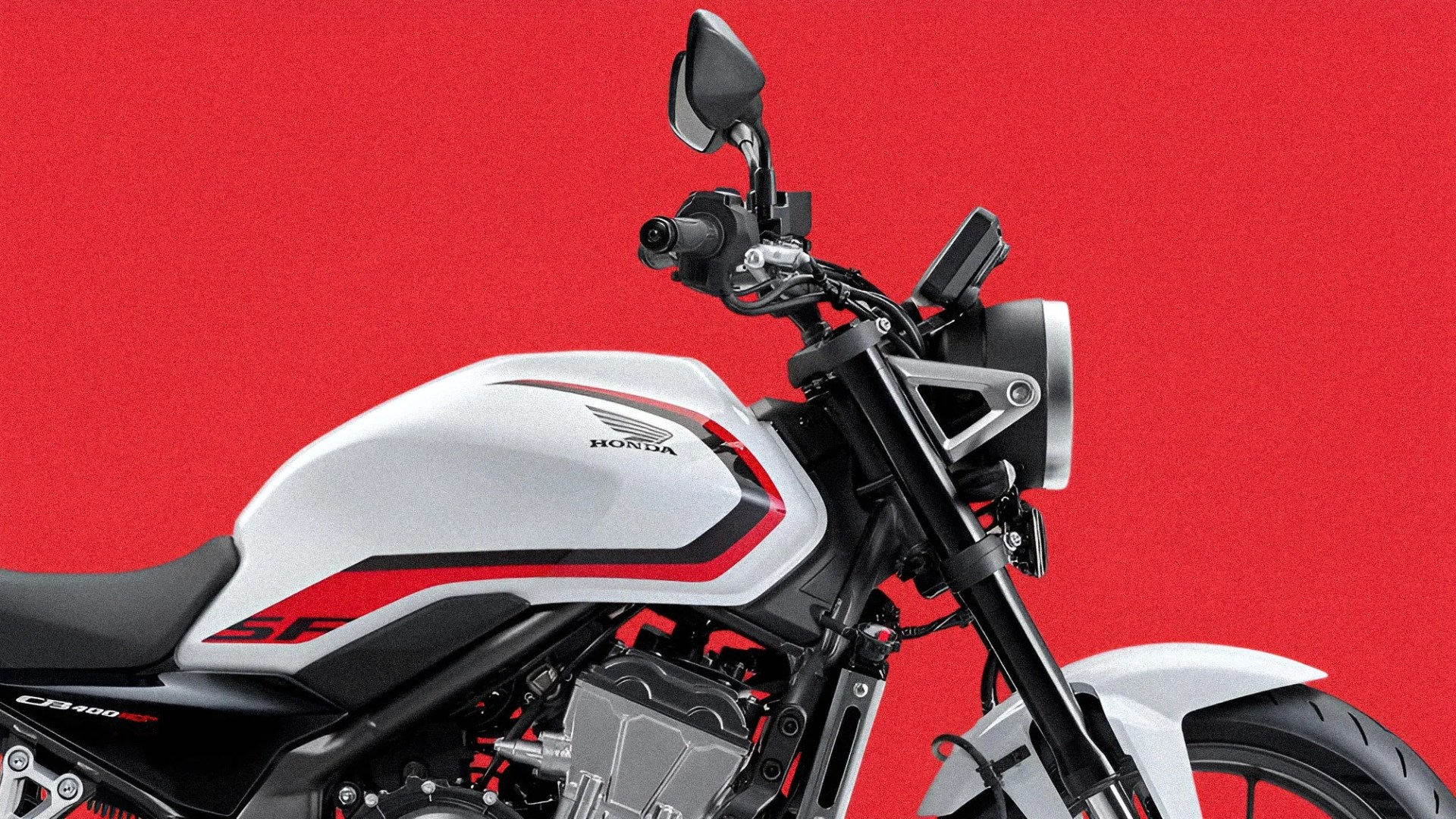 White Honda CB400SF motorcycle fuel tank and front fork against a red background.
