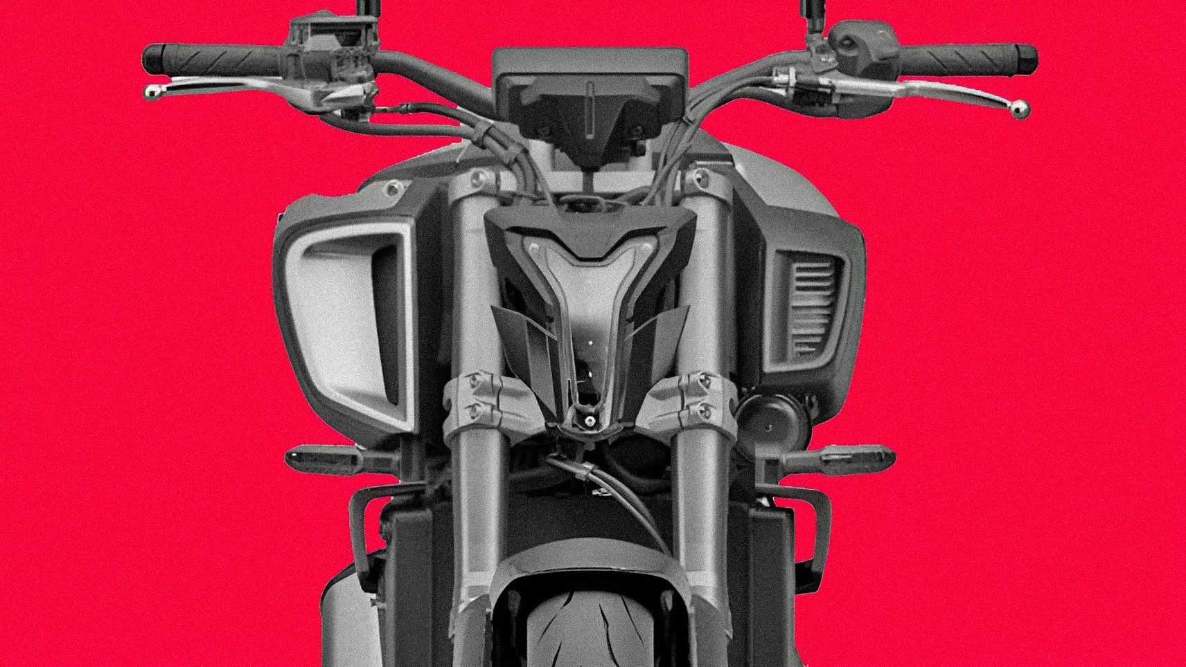Front view of a black motorcycle handlebar and front suspension against a red background.