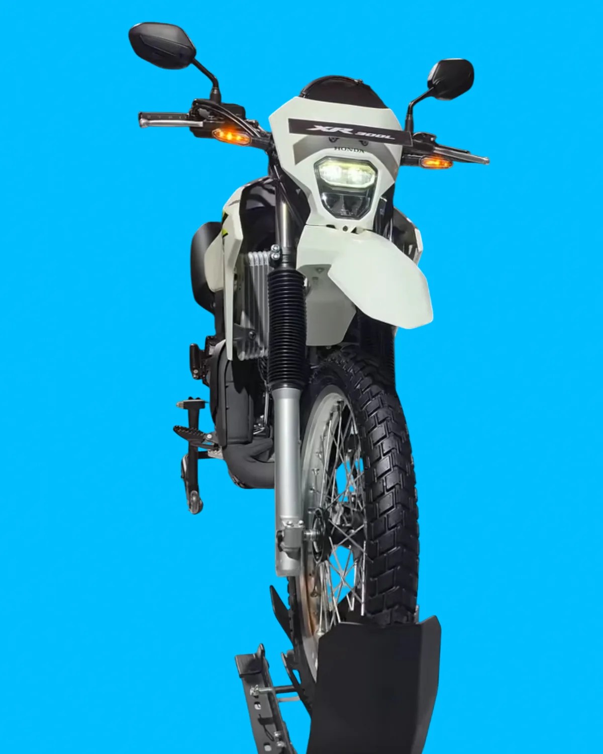 White Honda XR 160L motorcycle front view with black tires and mirrors on a blue background.