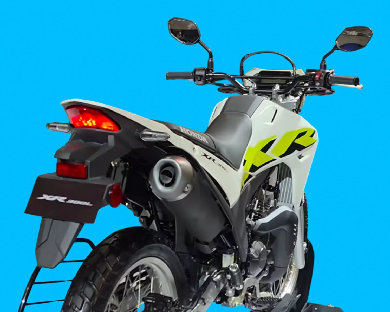 White and black Honda XR 190L motorcycle with yellow graphics, rear view on a blue background.