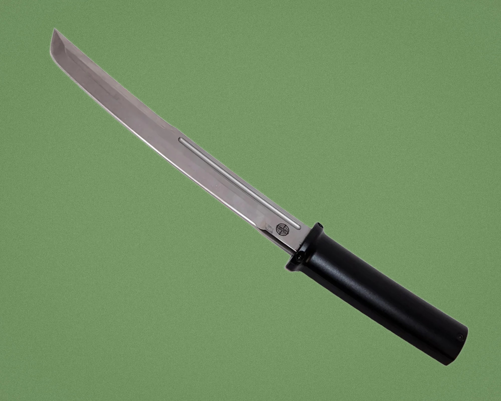 Silver metal knife blade with a black handle on a green background.