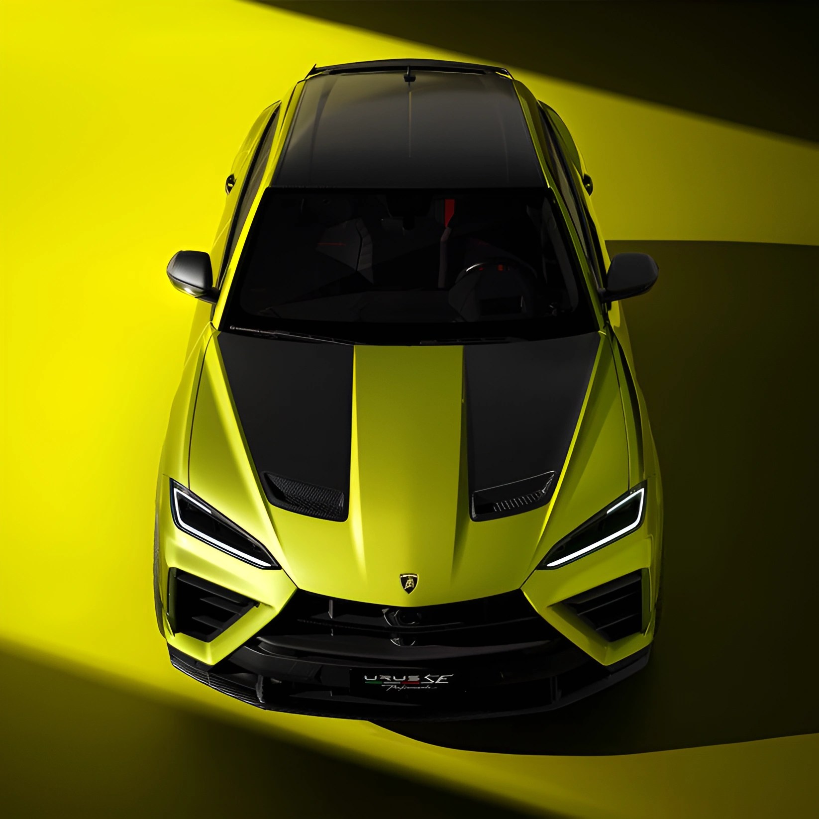 Top view of a lime green Lamborghini Urus with black racing stripes on a yellow and black background.