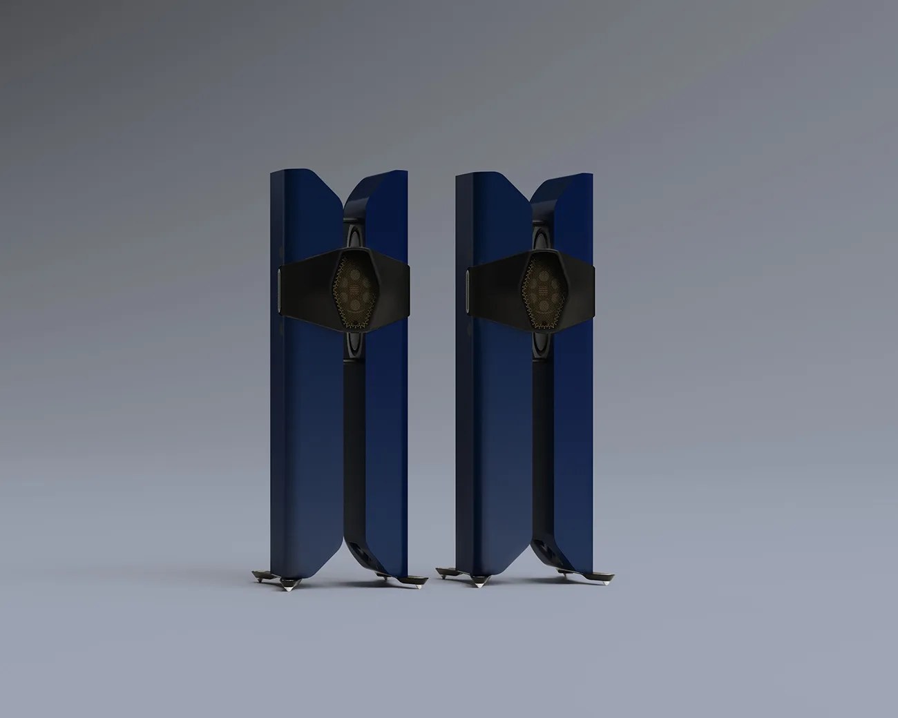 Pair of tall, dark blue floor-standing speakers with black central grille and silver spike feet on a gray surface.
