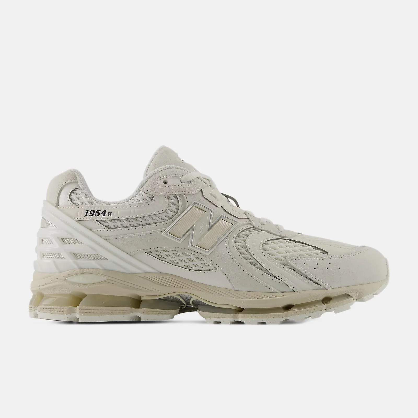 Off-white New Balance 1954R sneaker with mesh and suede upper and cushioned sole.