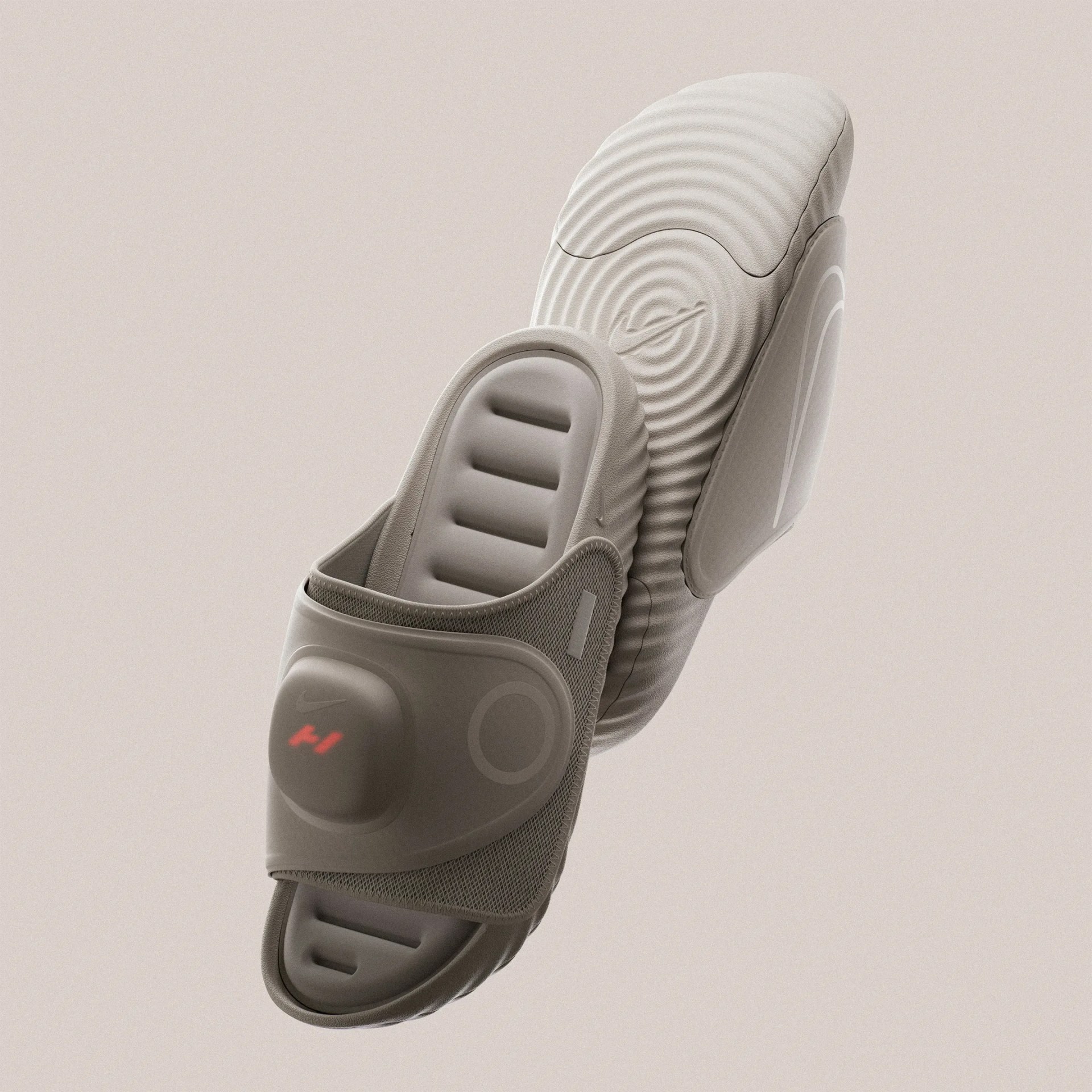 Light gray cushioned knee brace with adjustable straps and textured padding.